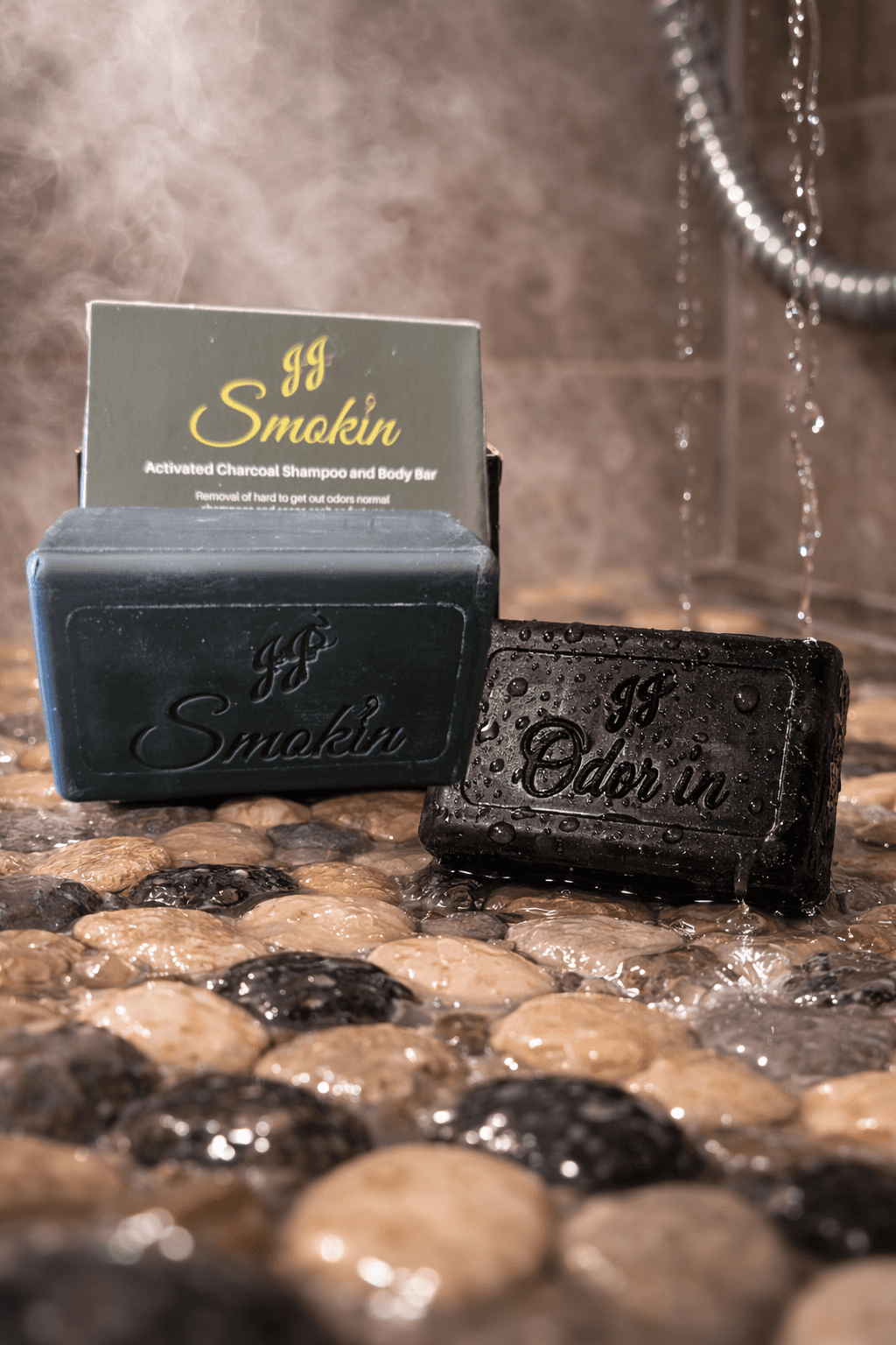 Woman holding JJ Smokin charcoal soap.