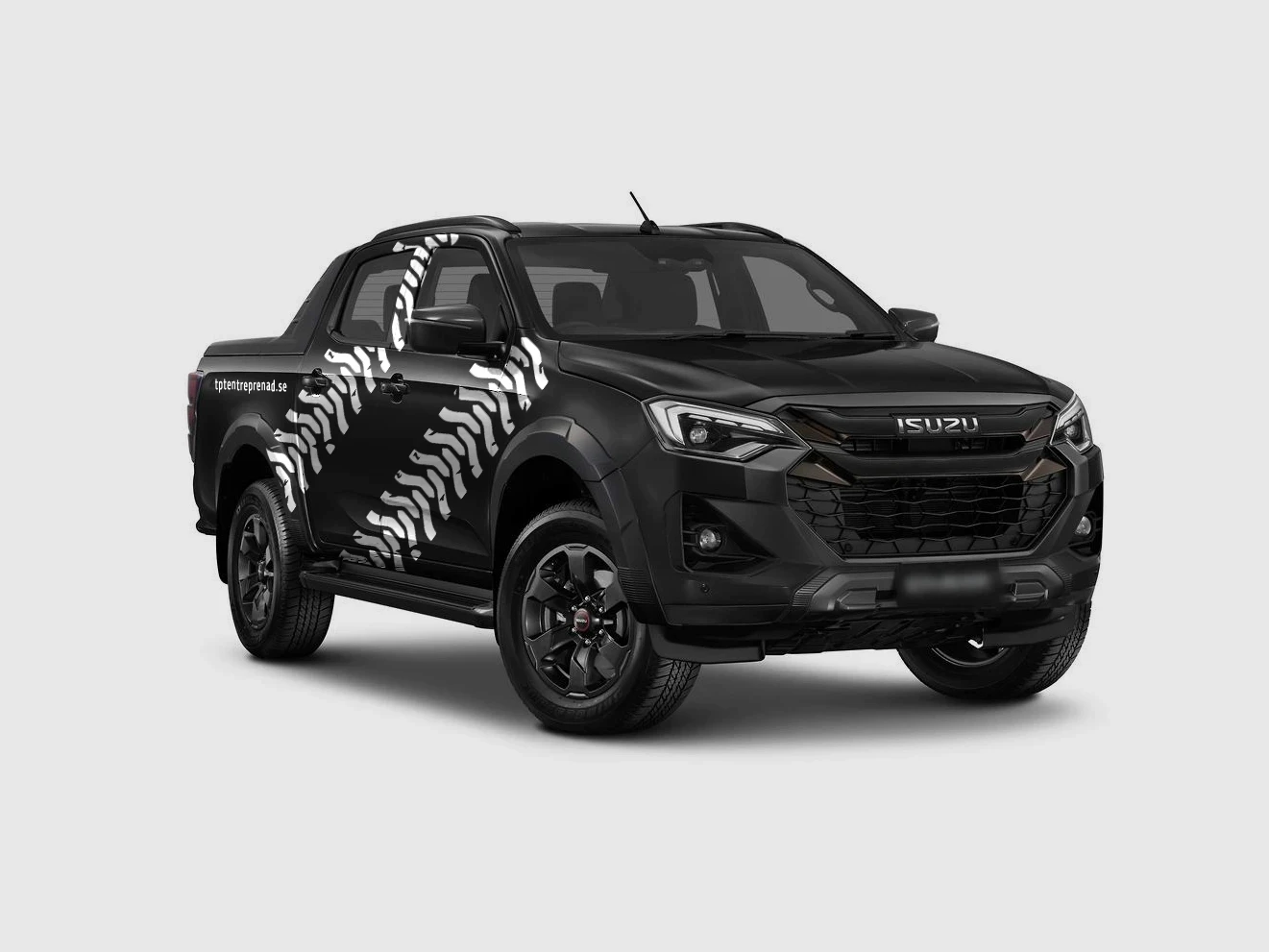 En pickup med TPT Entreprenads mönster på