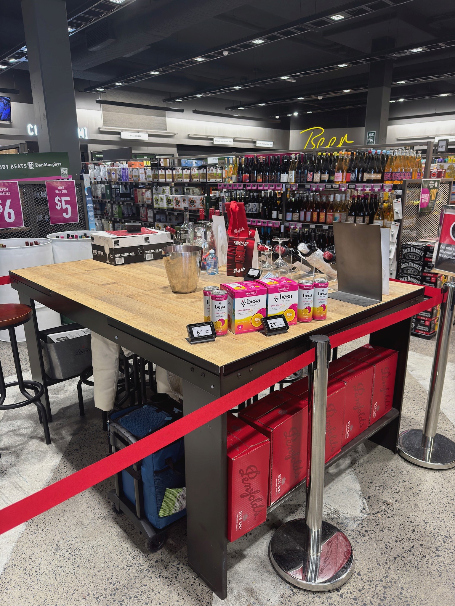 cans of hard seltzer and a red solo cup