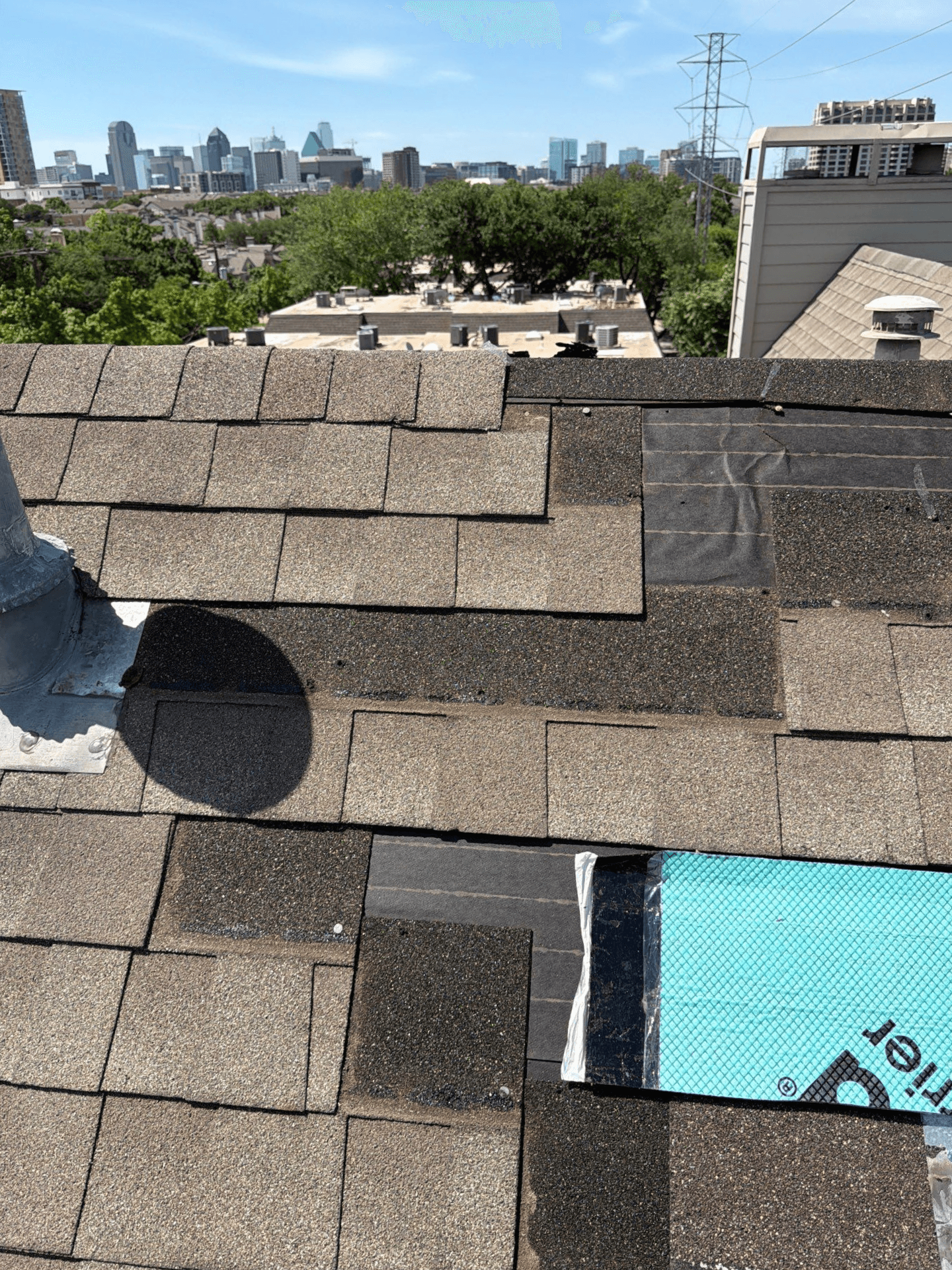 top of apartment building roof angle of dallas skyline