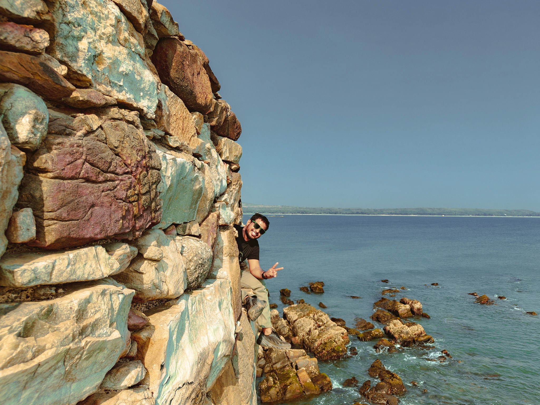 Image of Sushrut sitting on fort overlooking mountains