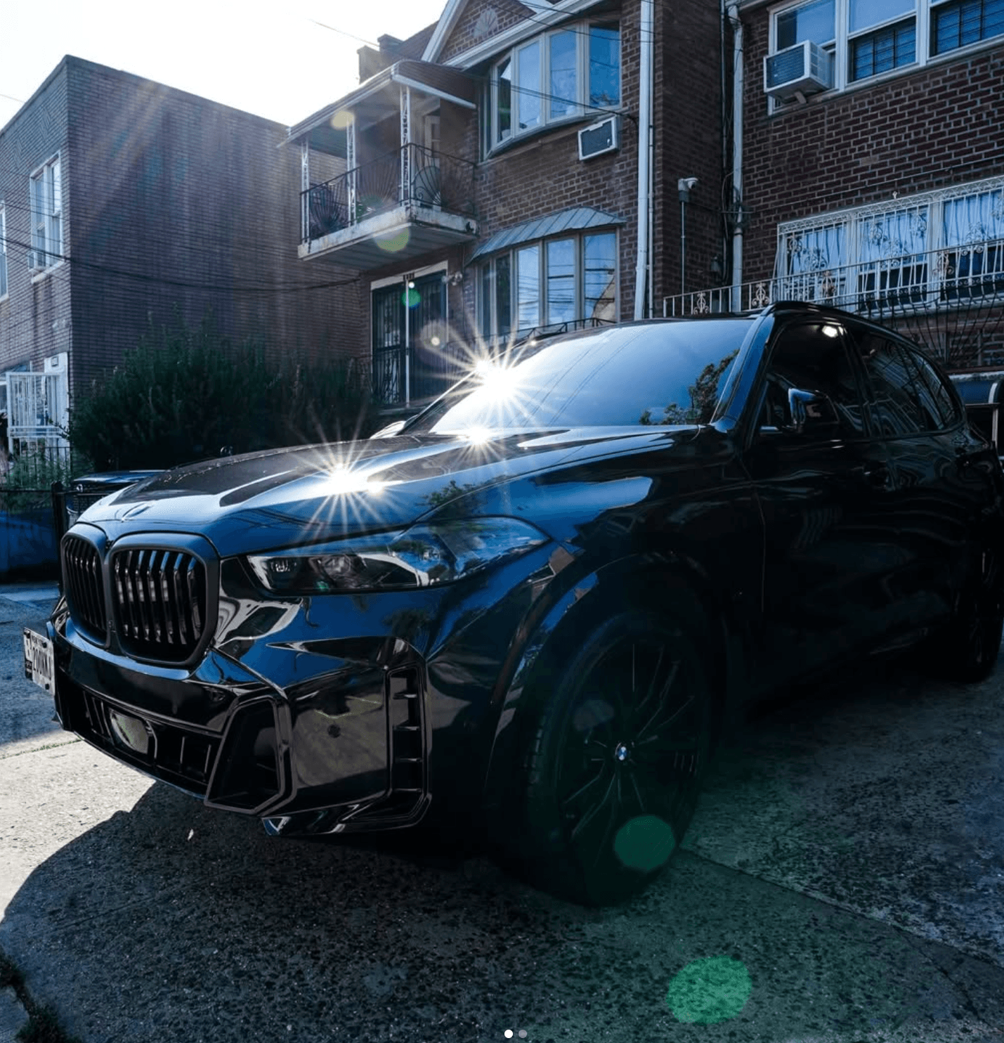 Mobile ceramic coating service NYC - XENTRA AUTO technician applying 9H ceramic coating