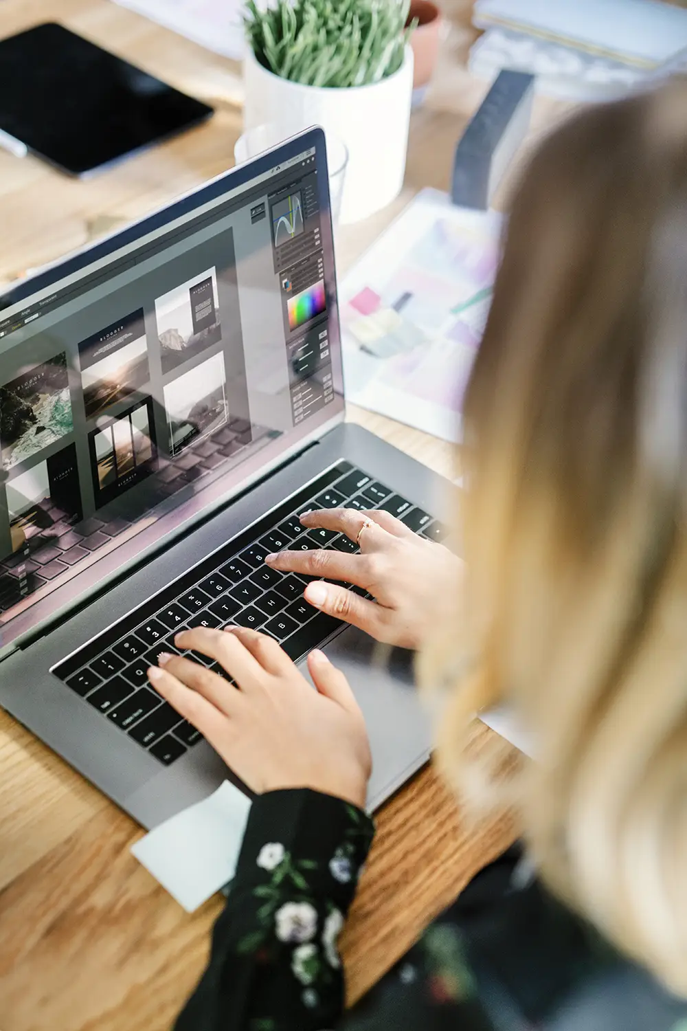 A webdesigner hard at workd building designs