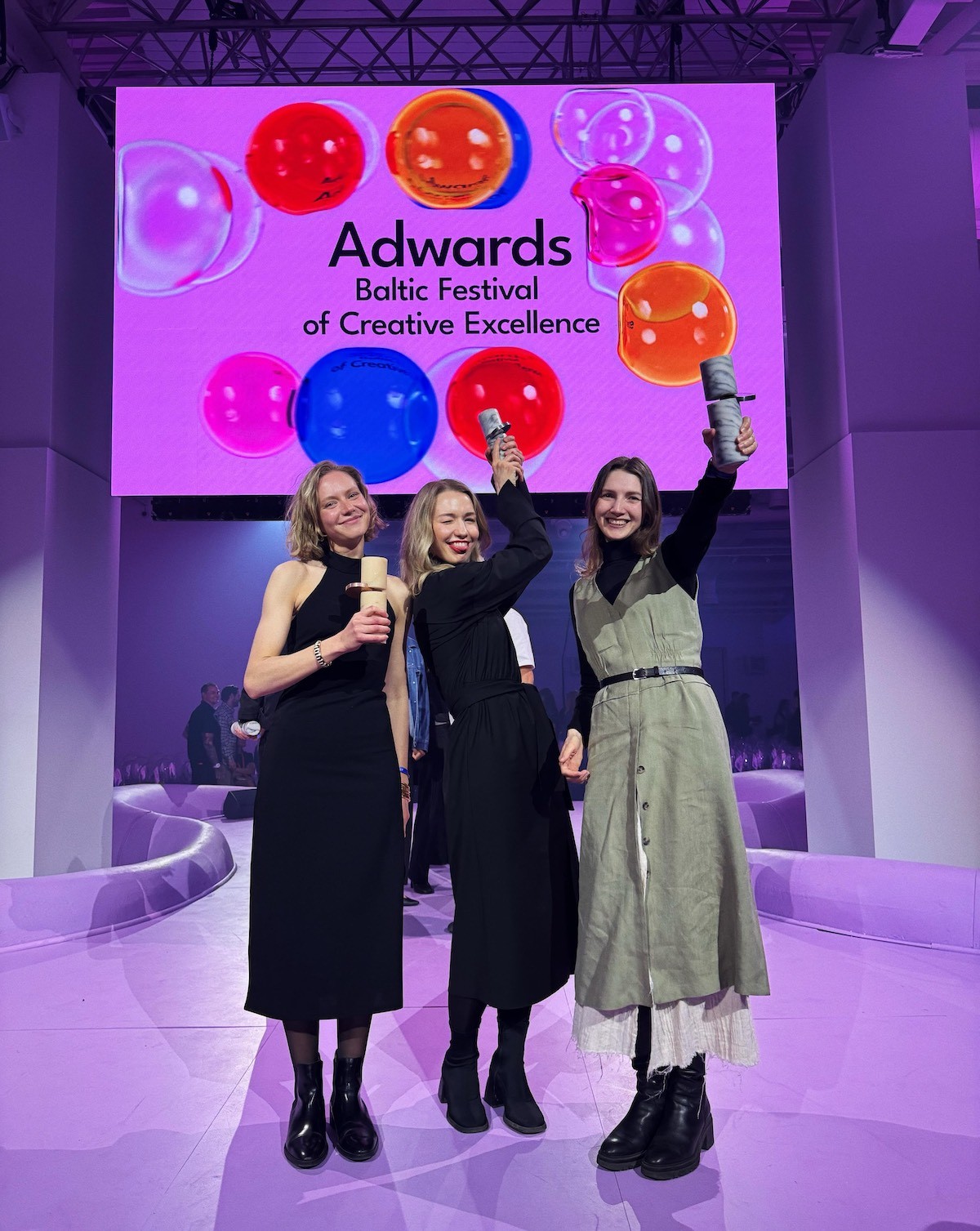 Ausme team holding awards on stage at Adwards 2026