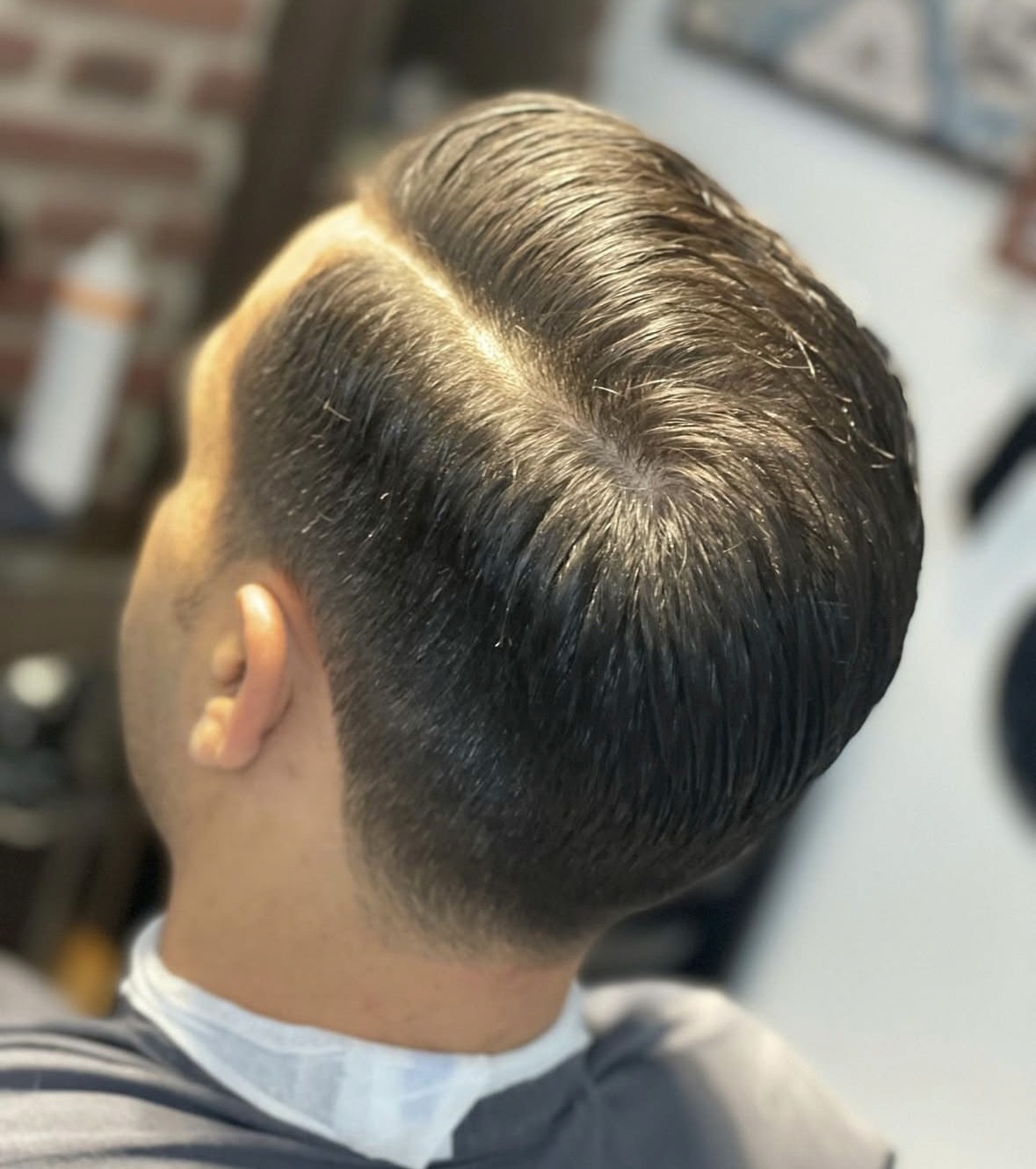 Herrenhaarschnitt mit Fade und Übergang