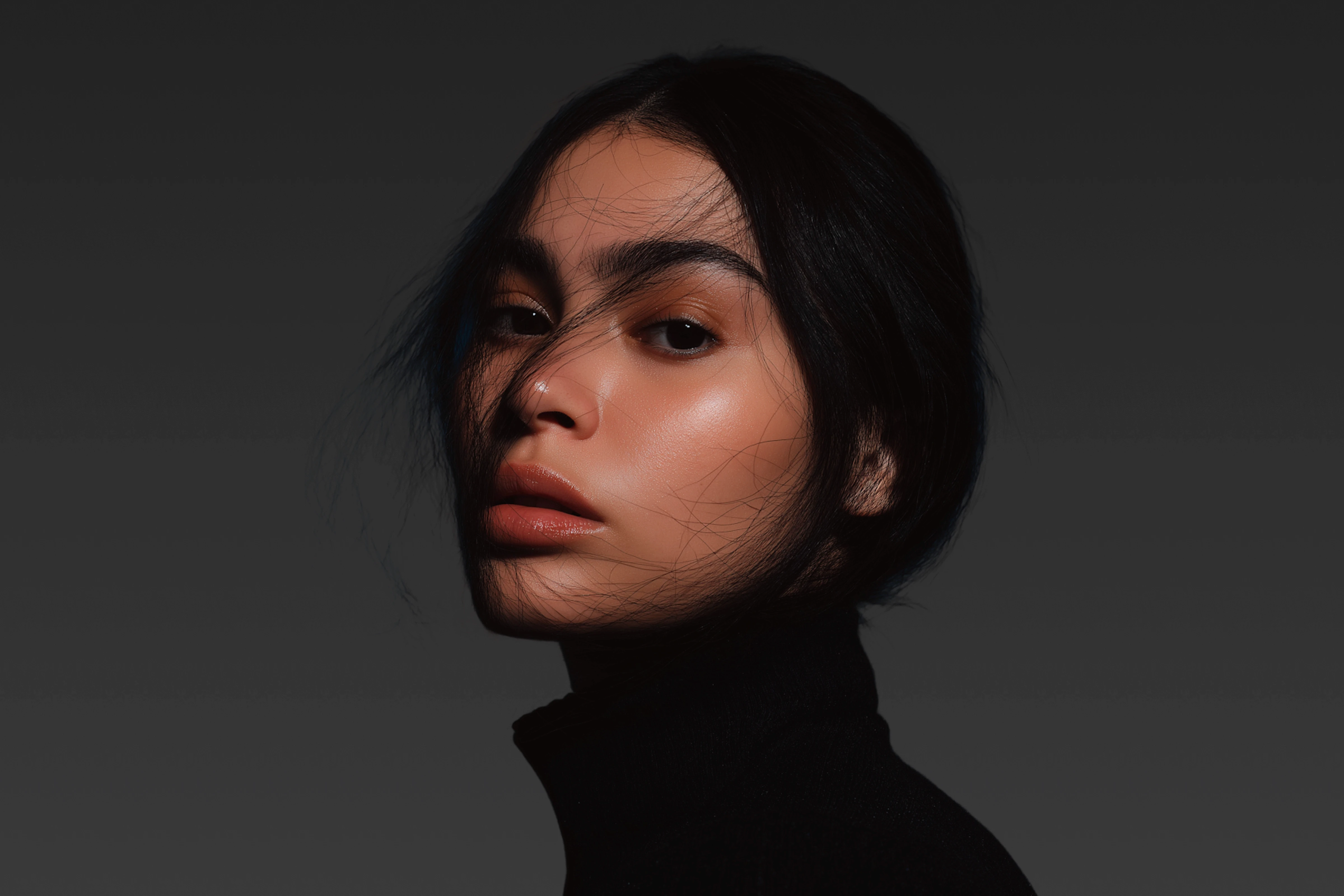 Woman wearing black top