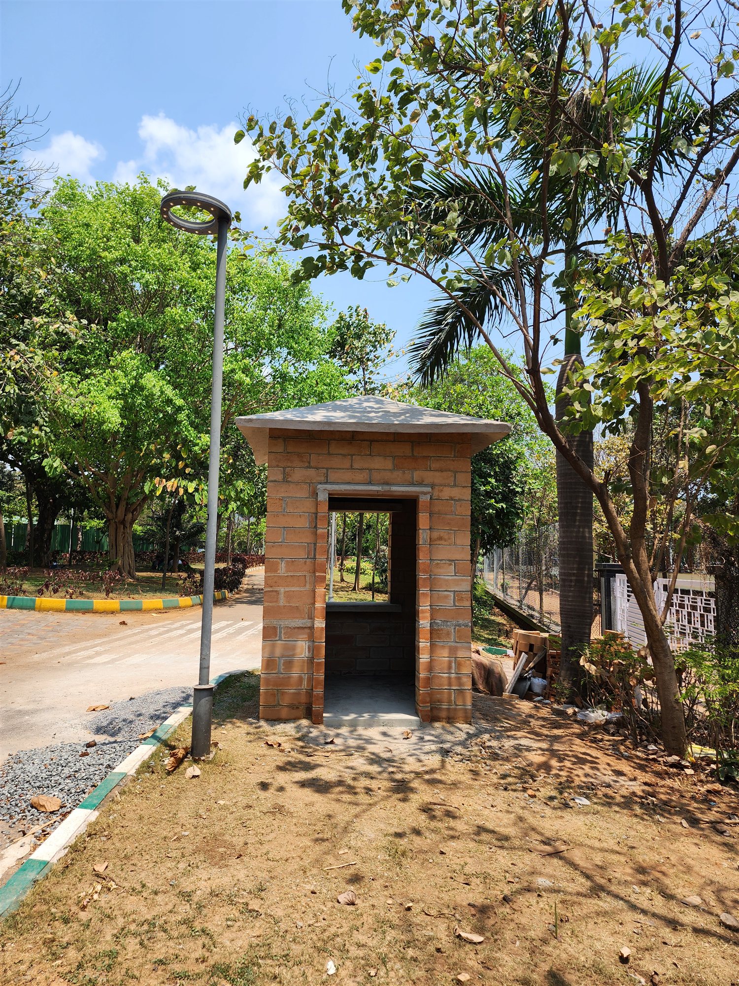 The finished Agrocrete® ticket counter beside a landscaped path at VMRDA Central Park, Visakhapatnam