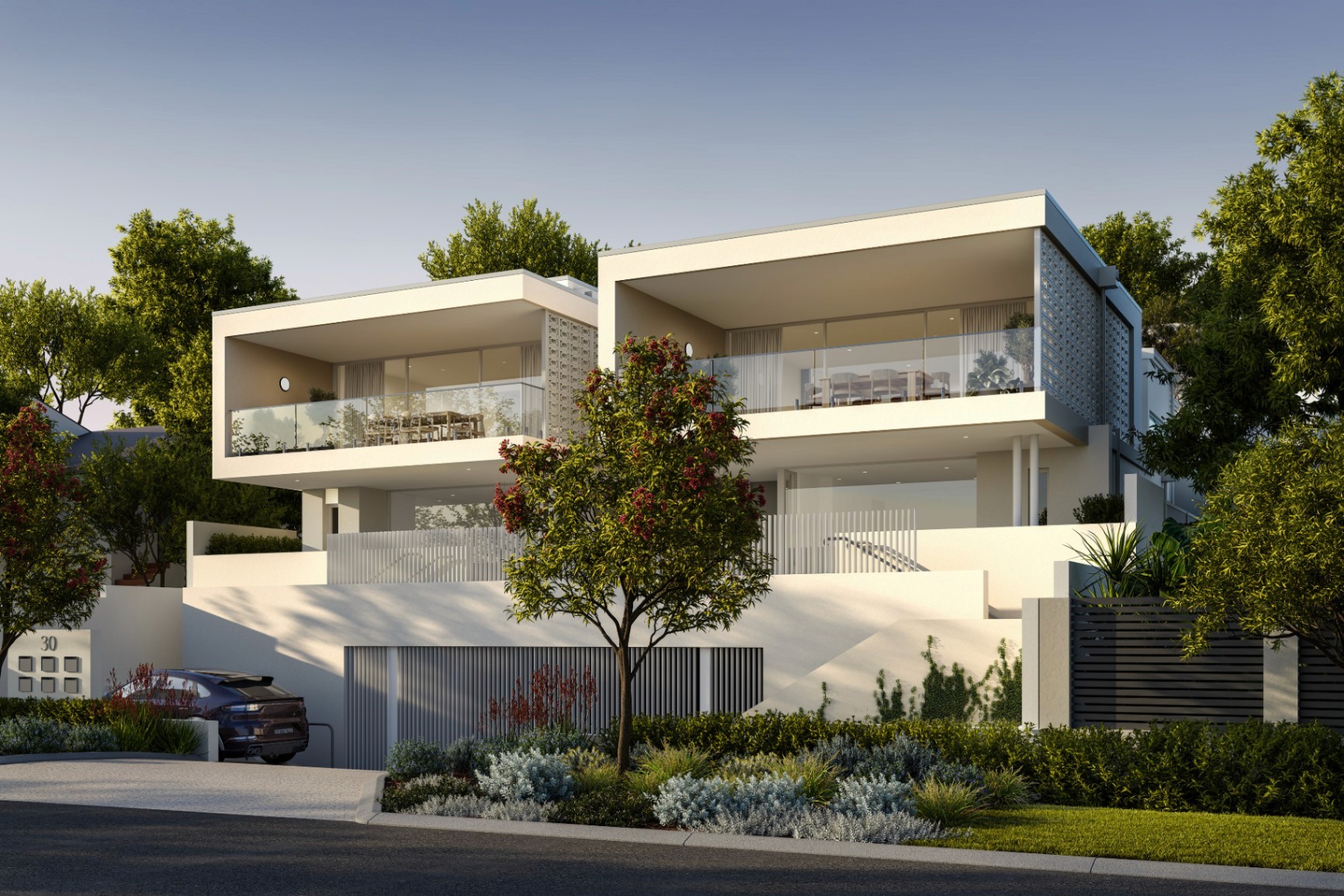 Luxury architect-designed duplex townhouses in Scarborough Perth with modern coastal design, balconies, and landscaped frontage near the beach