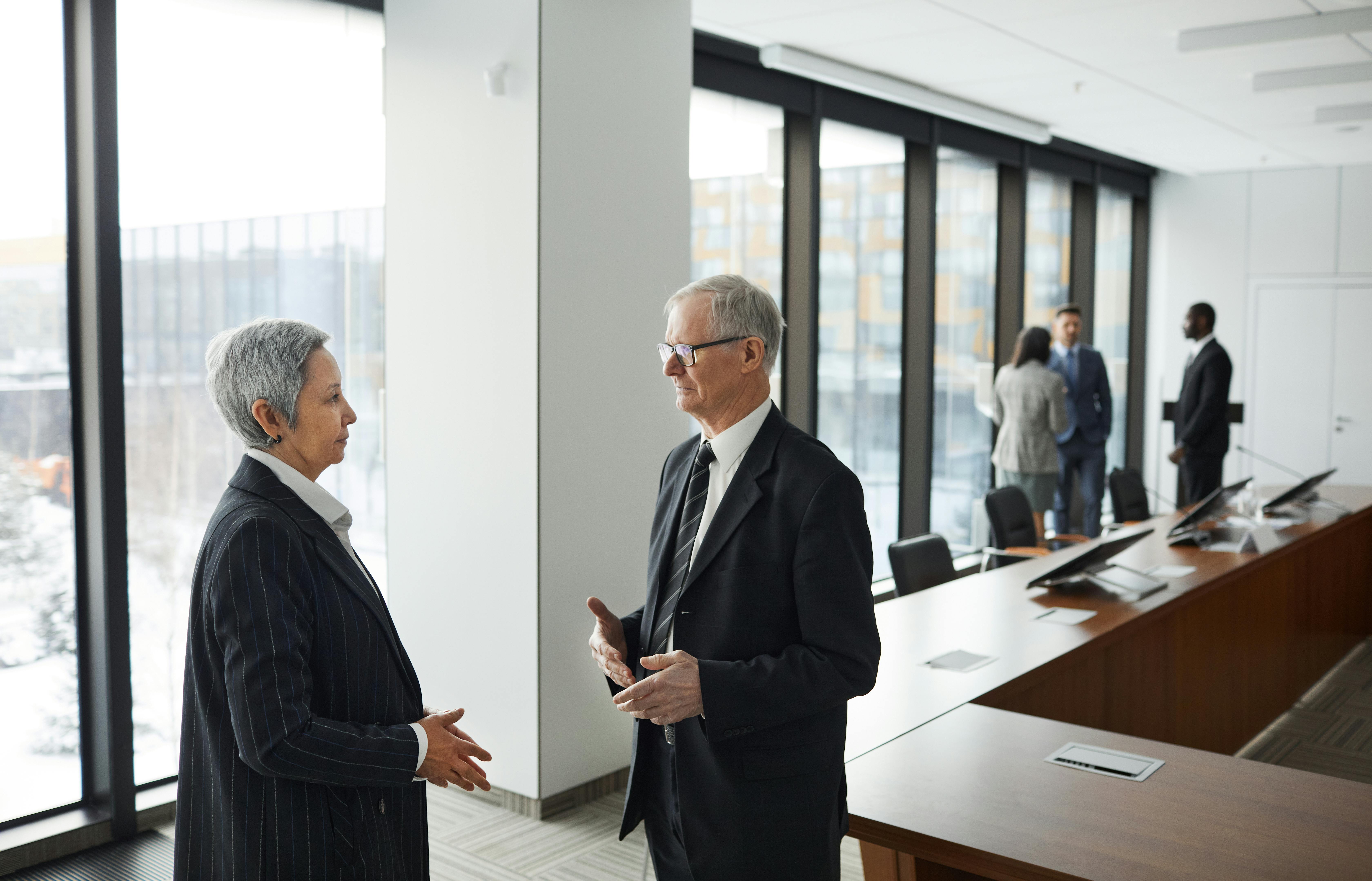 Two buisness people discuss ideas on next steps for SaferMobility