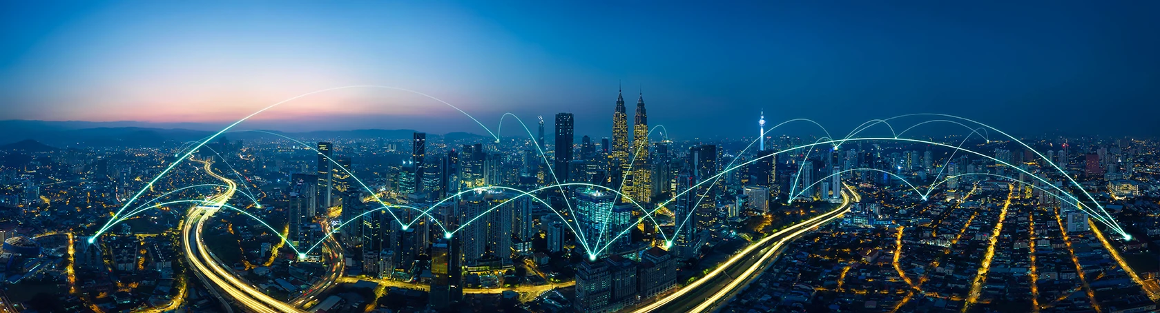 A cityscape with network nodes bouncing from building to building.