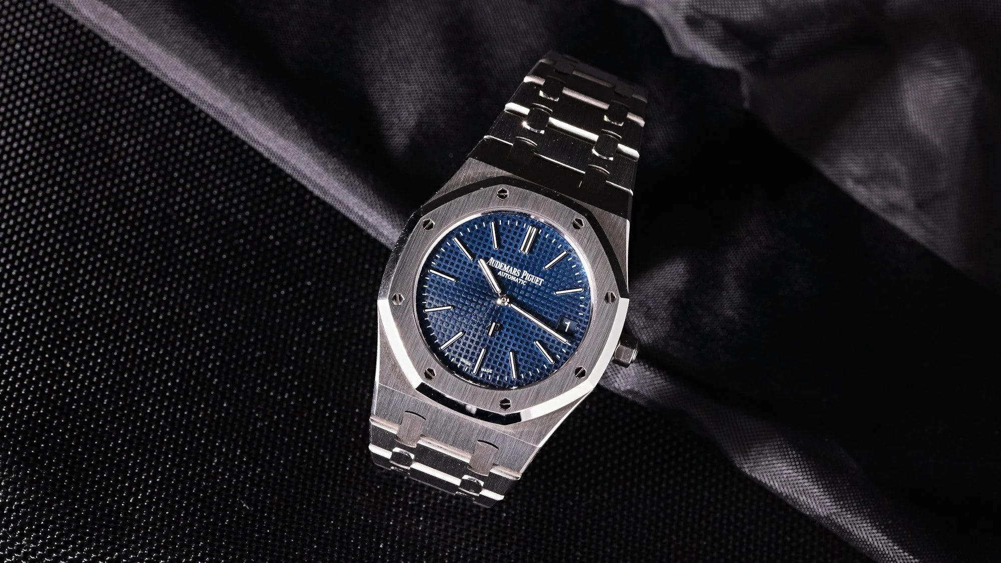Audemars Piguet Royal Oak watch with blue dial, stainless steel