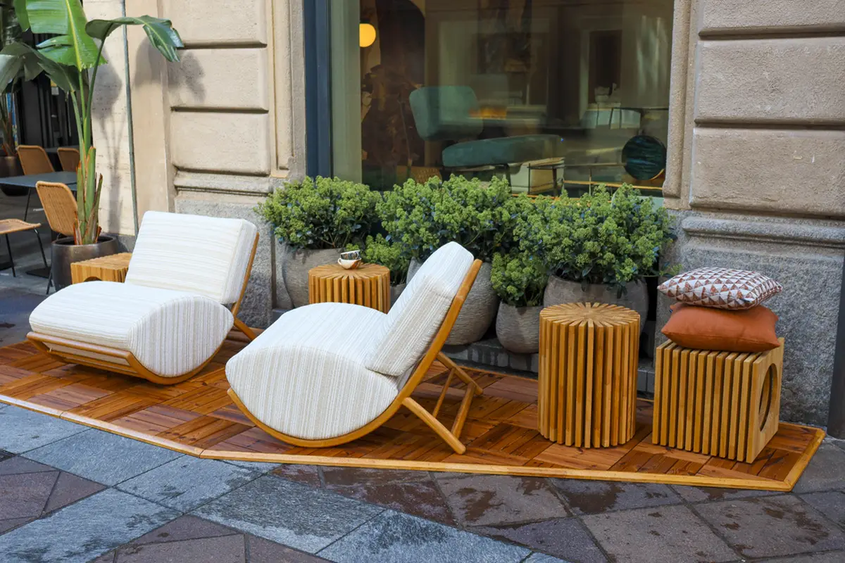 Outdoor furniture setting featuring luxury Italian furniture and handmade modern design by Italian furniture manufacturers.