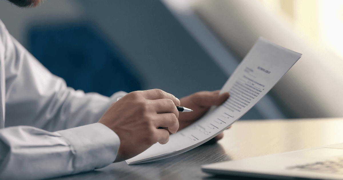 A person reading through legal appeal documents.