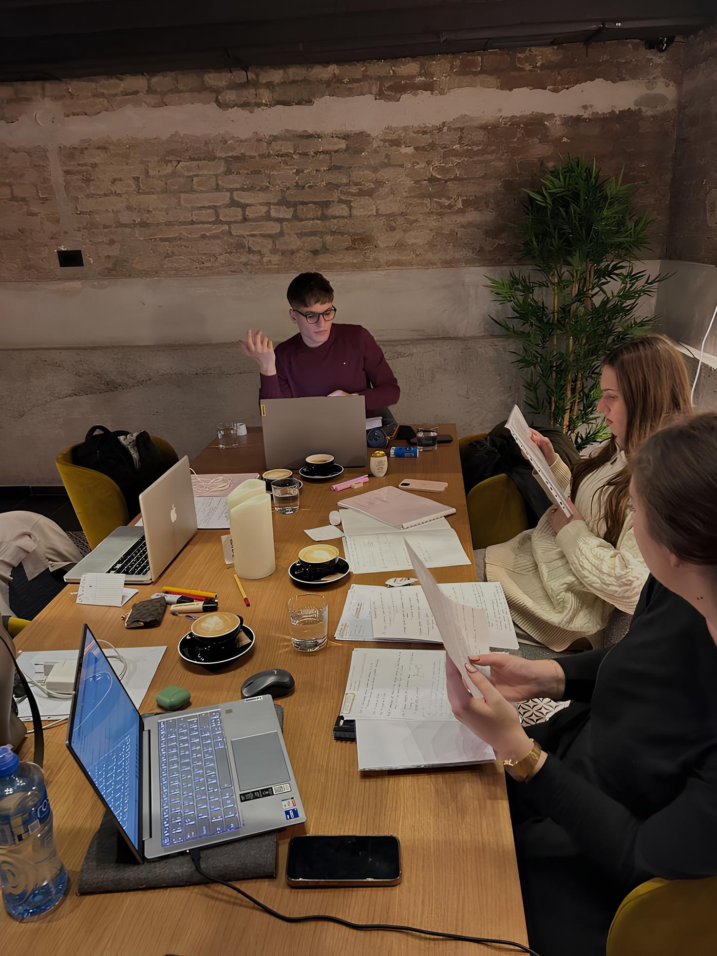 two ladies looking at a laptop and smiling