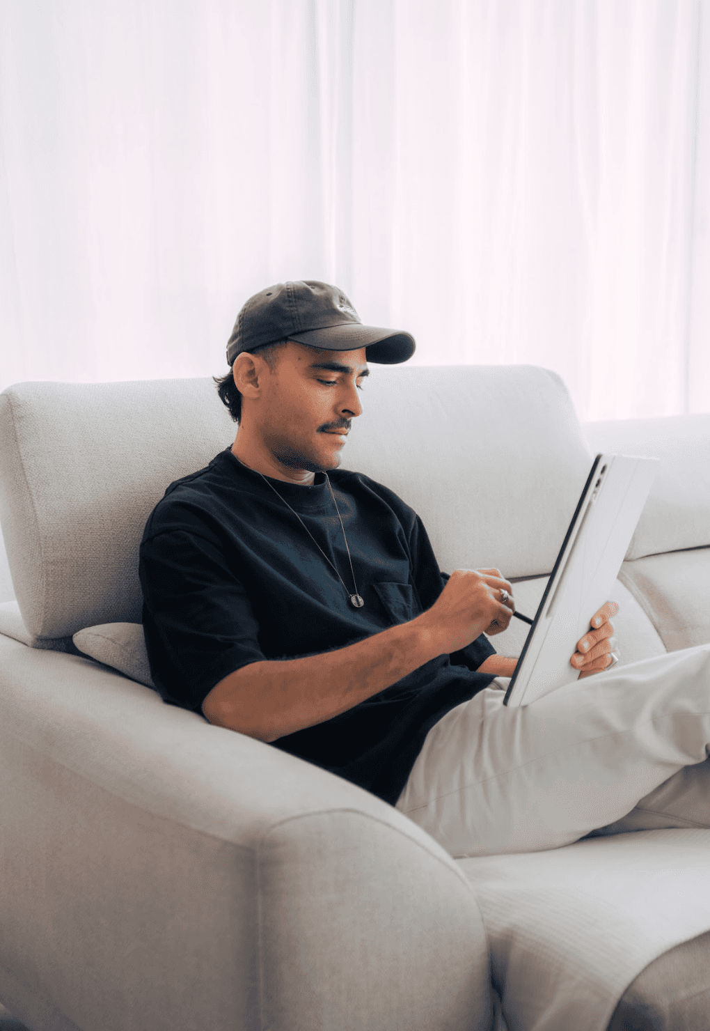 Close up of a man holding design papers
