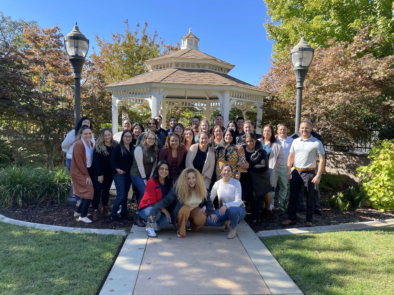 Gemini Legal's Sales Team across California large group of diverse employees in front of gazebo