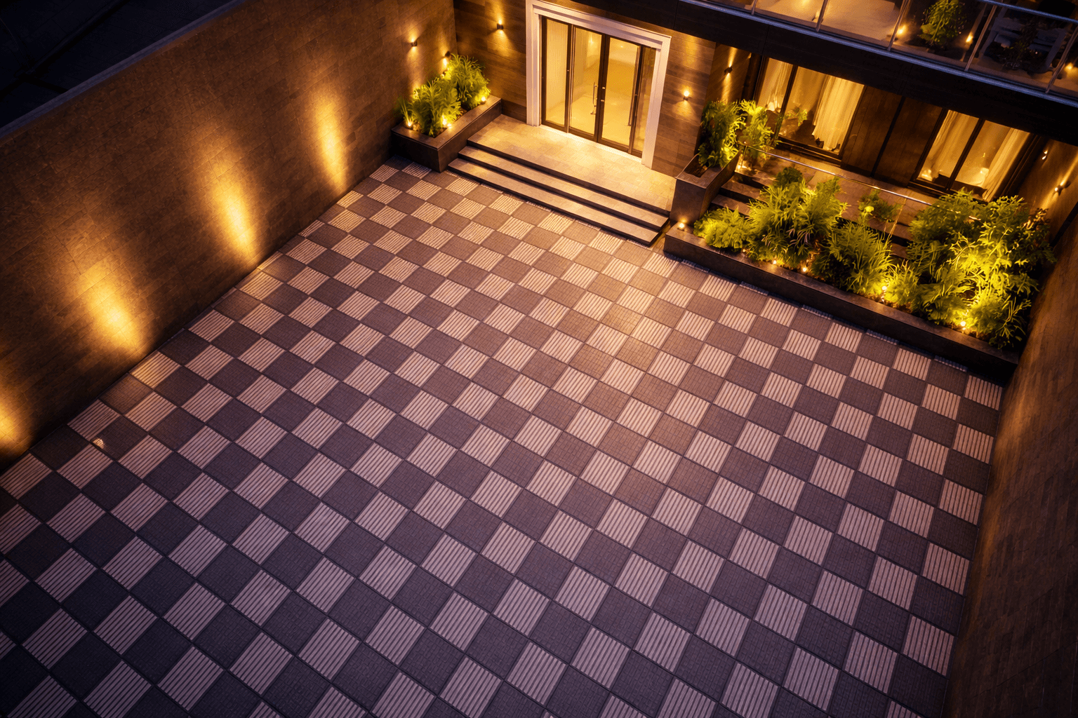 Zabarro stone paving used in large outdoor space with repeating patterned design and architectural lighting