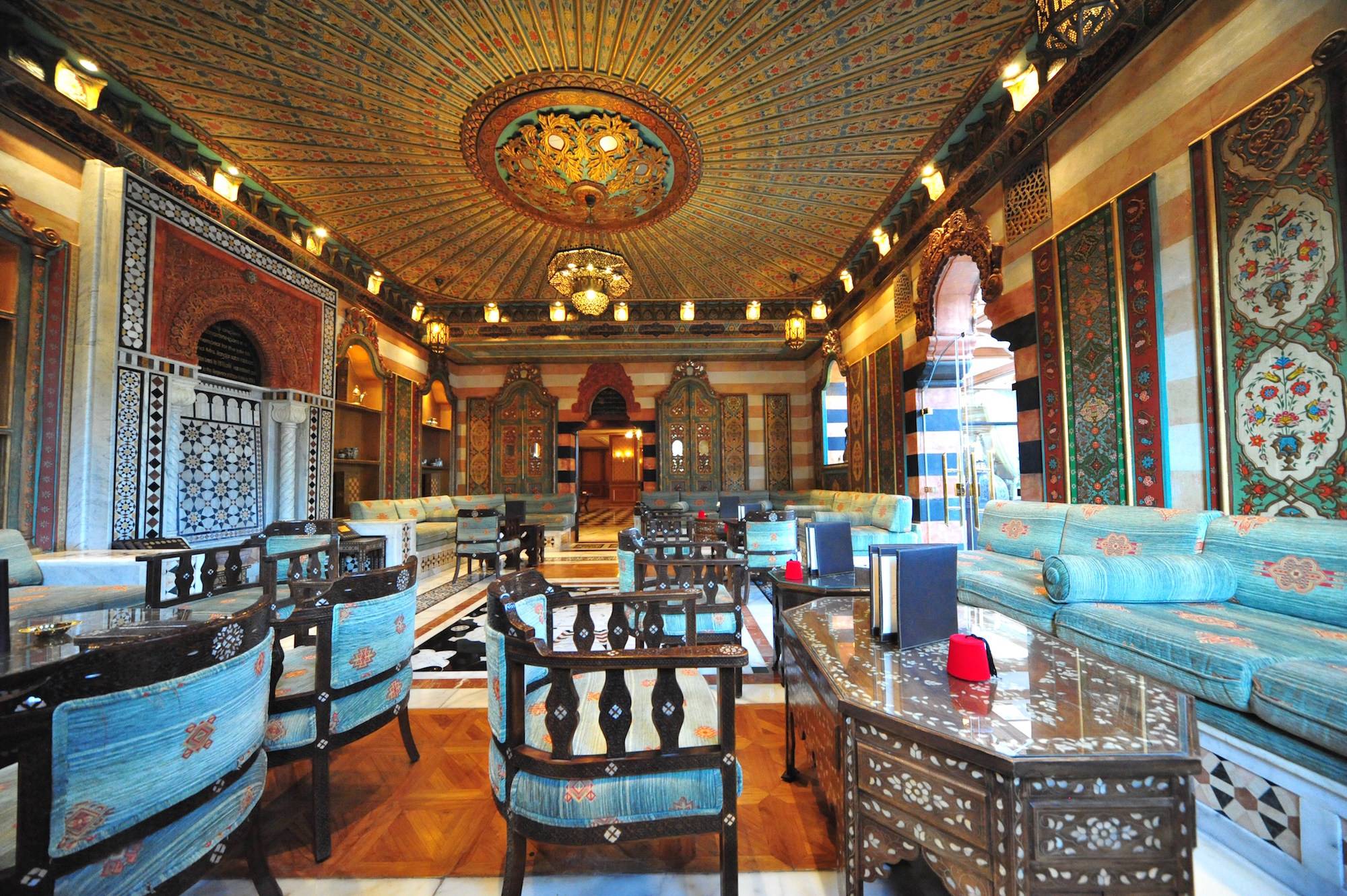 Oriental lounge with hand-painted ceiling and mother-of-pearl furniture