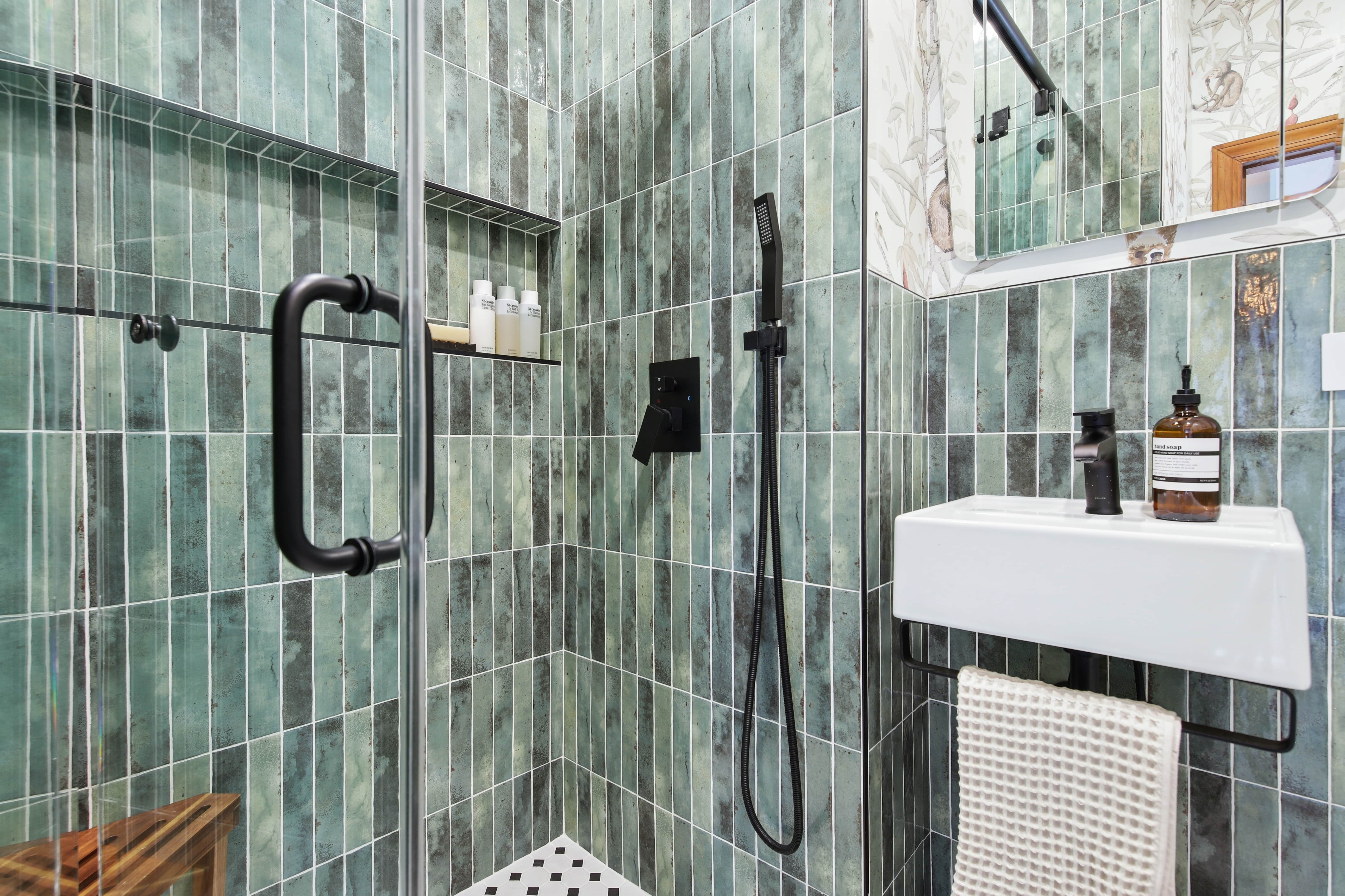 green tiled modern bathroom