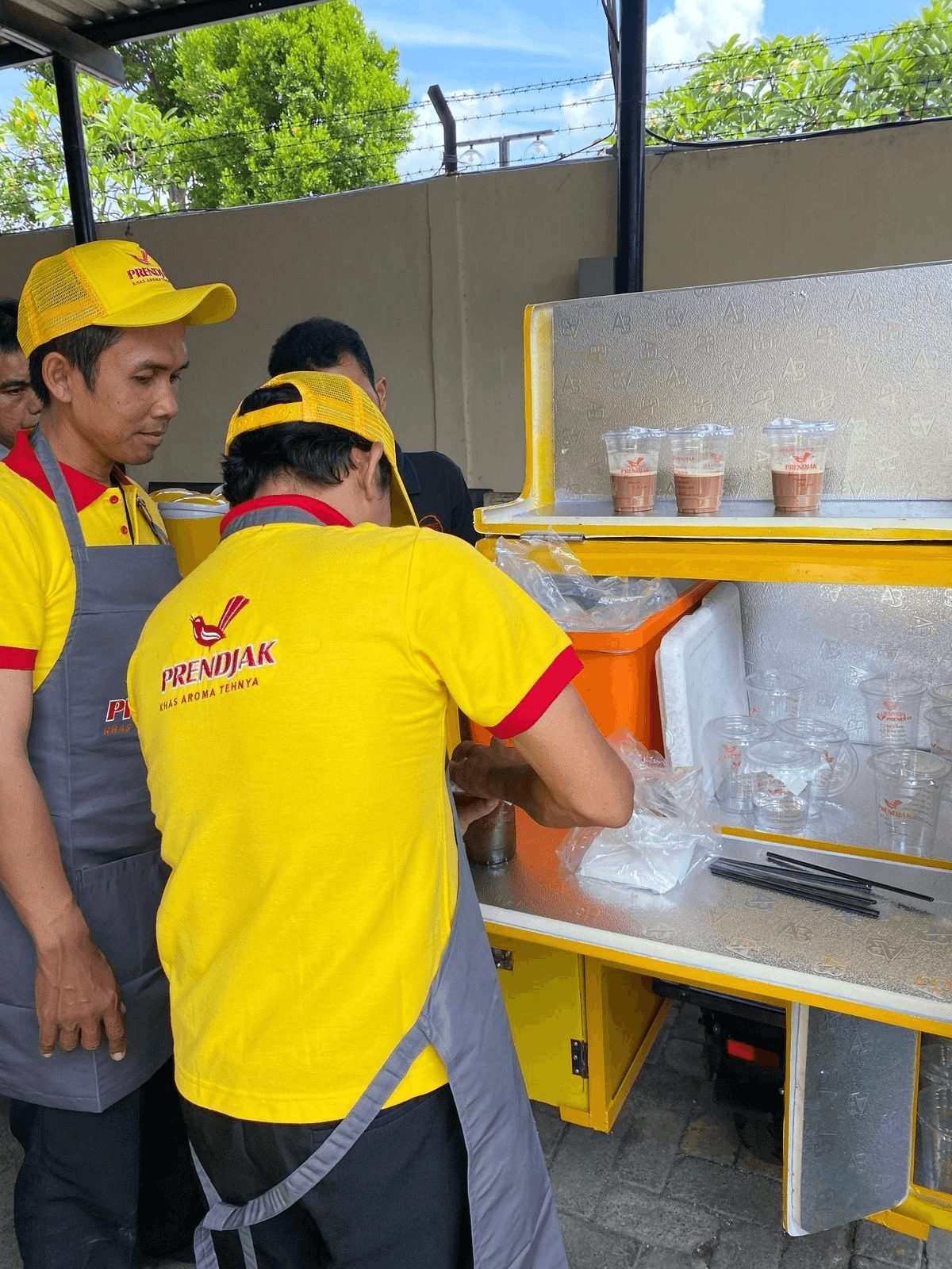 Tea beverage brand Prendjak preparing drinks at a local distribution point, showcasing Baskit's support in expanding local retail presence and simplifying last-mile operations.