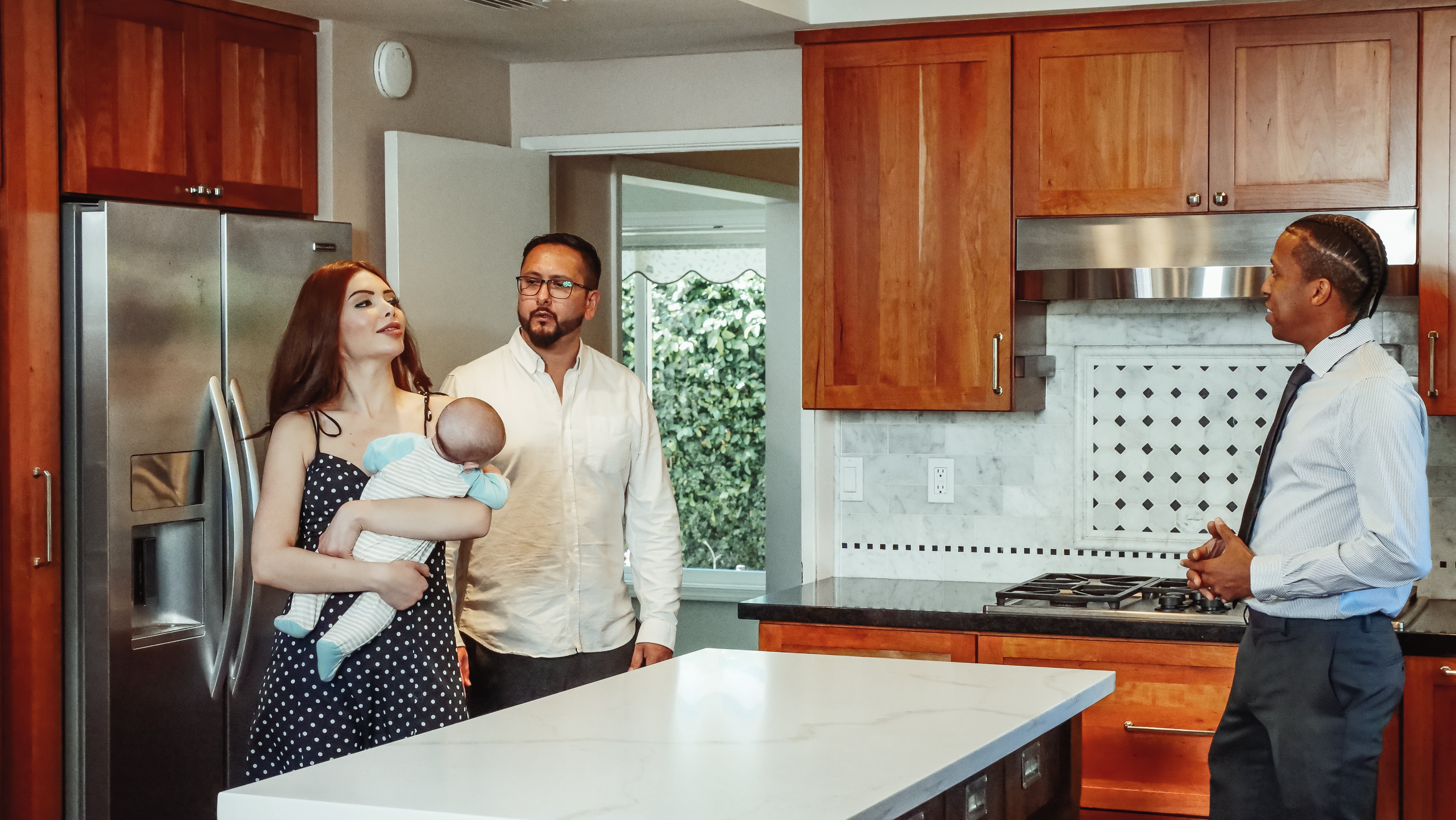 Couple talking to a mortgage broker