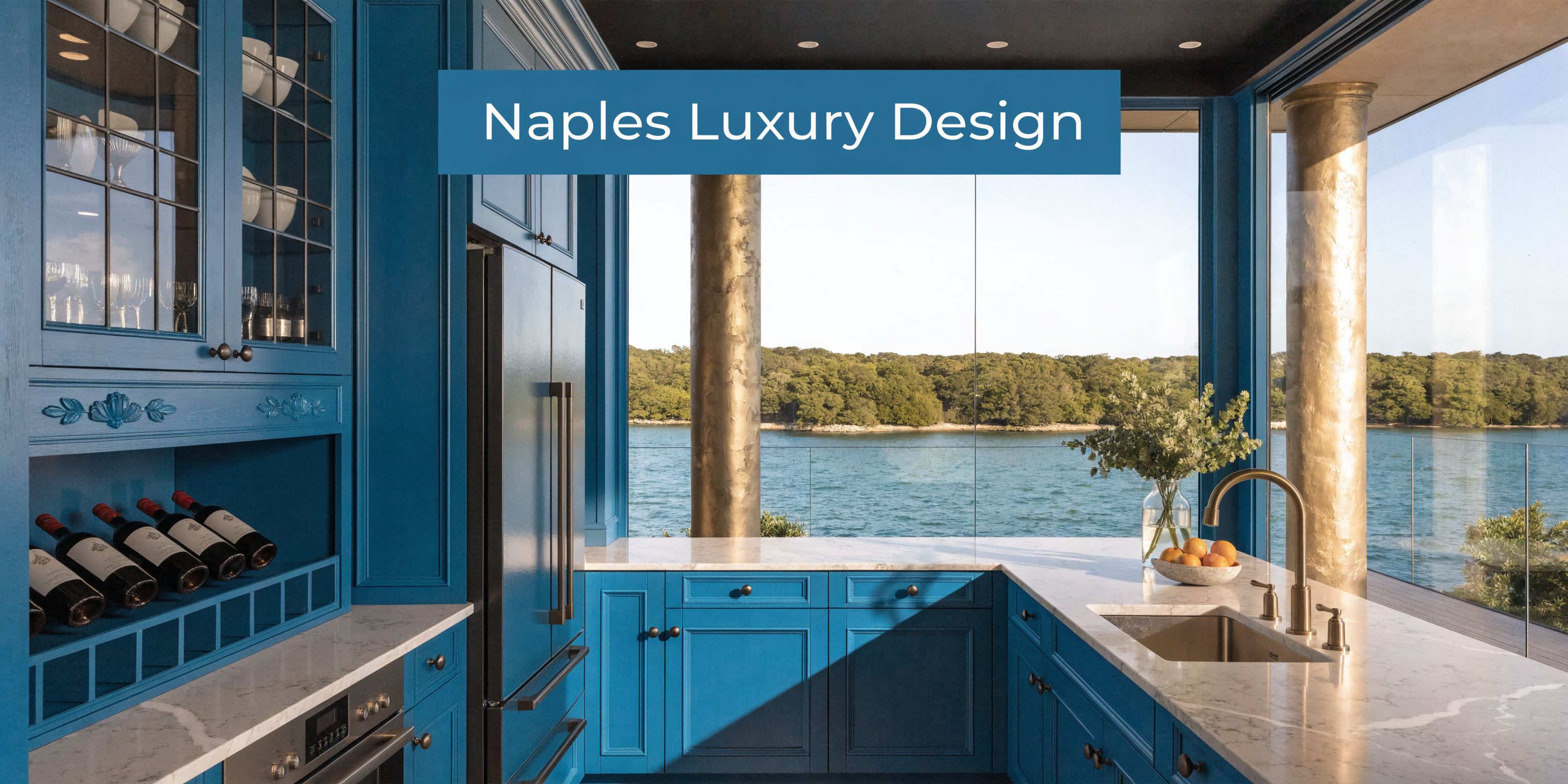 A luxurious kitchen with vibrant blue cabinets, marble countertops, and a stunning waterfront view through floor-to-ceiling windows.