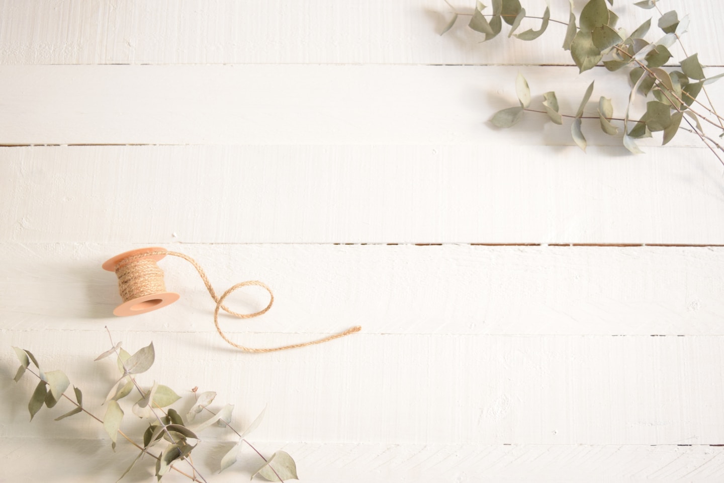 A spool of linen thread on the bench