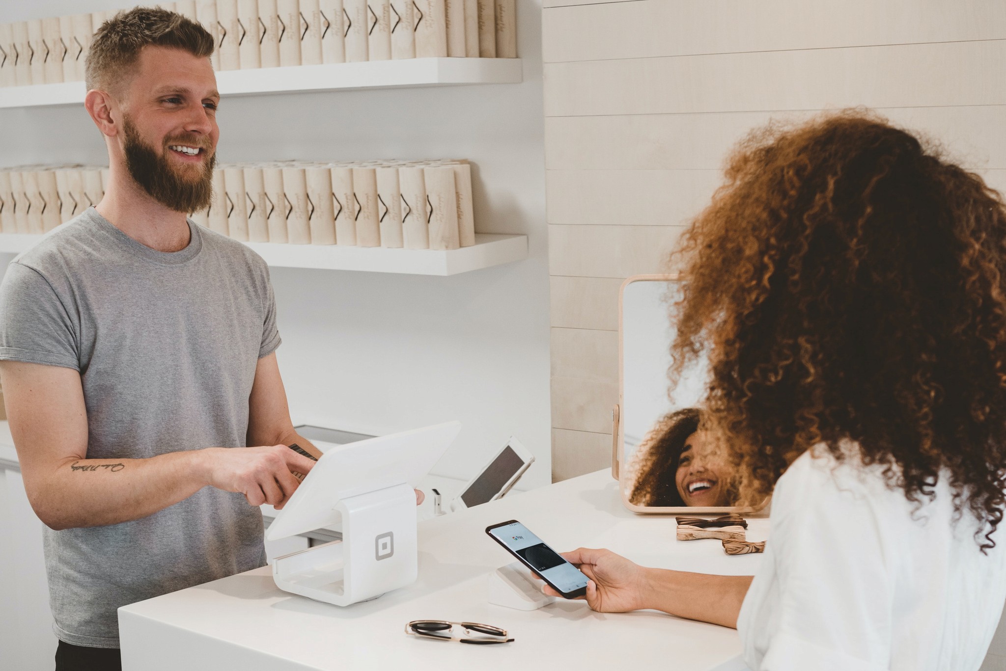 Woman paying for items at store