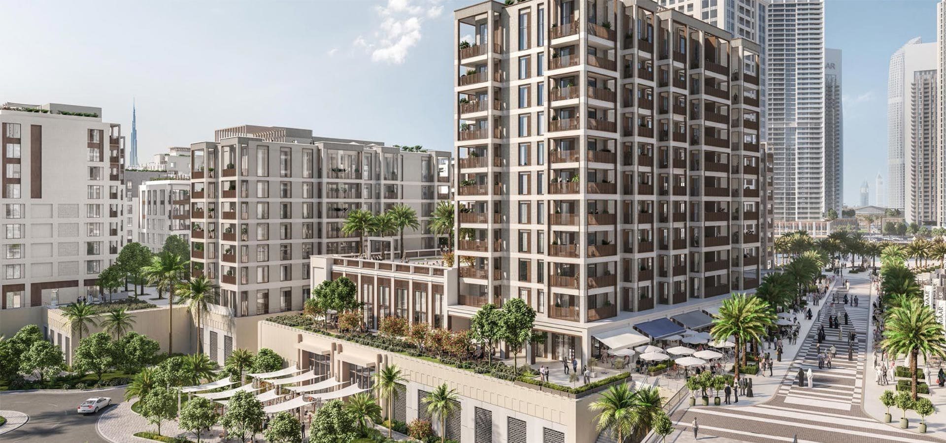 New residential tower in Dubai, featuring a modern design and surf-inspired architecture against a clear blue sky.