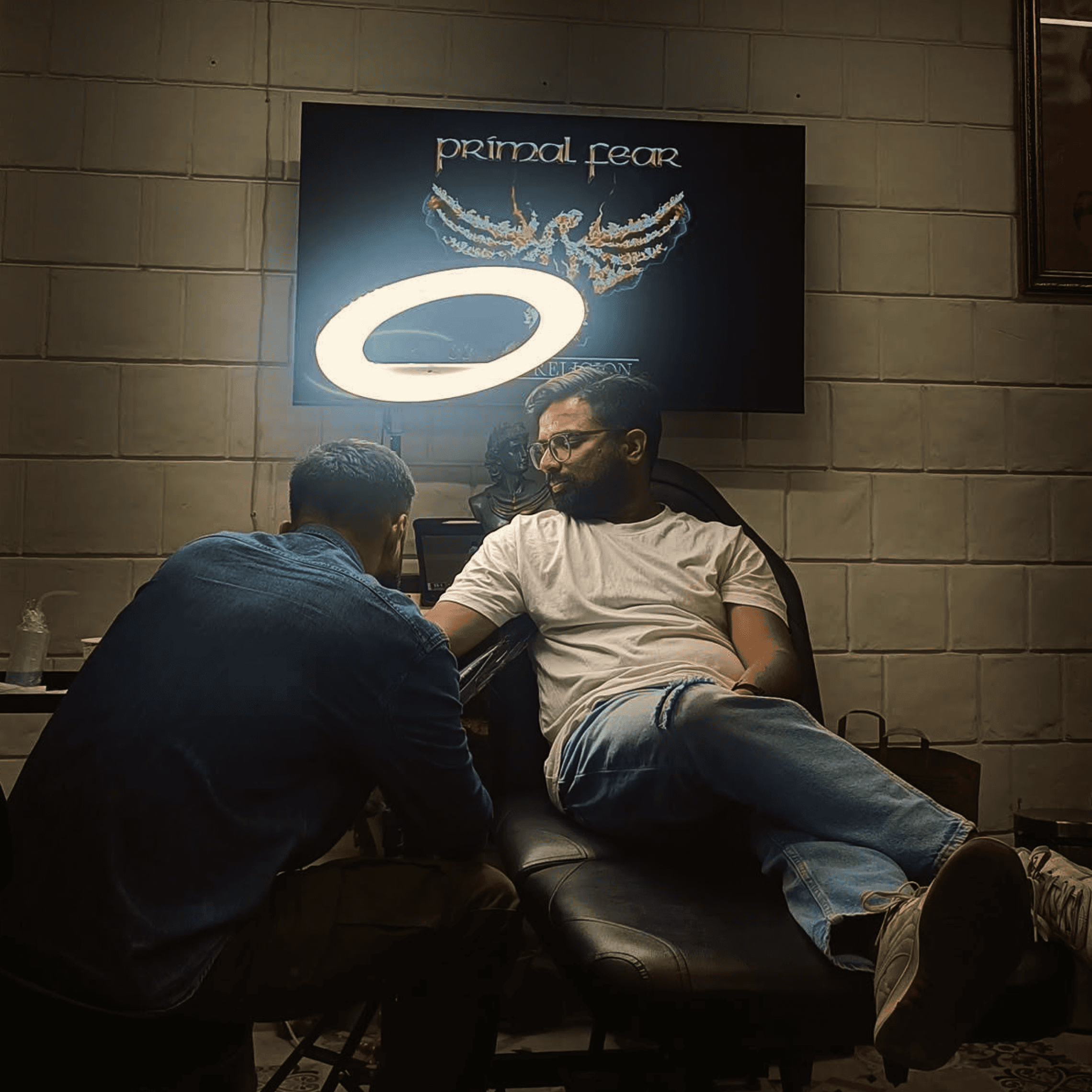 a picture of a person getting a tattoo