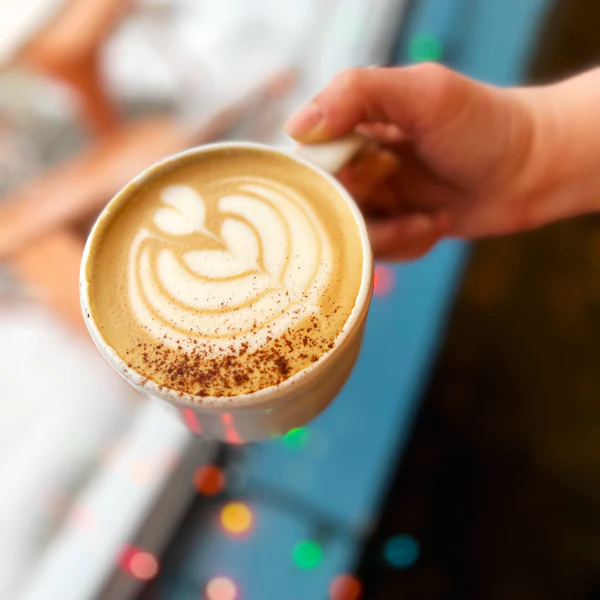 A photo taken at an overhead angle of latte art