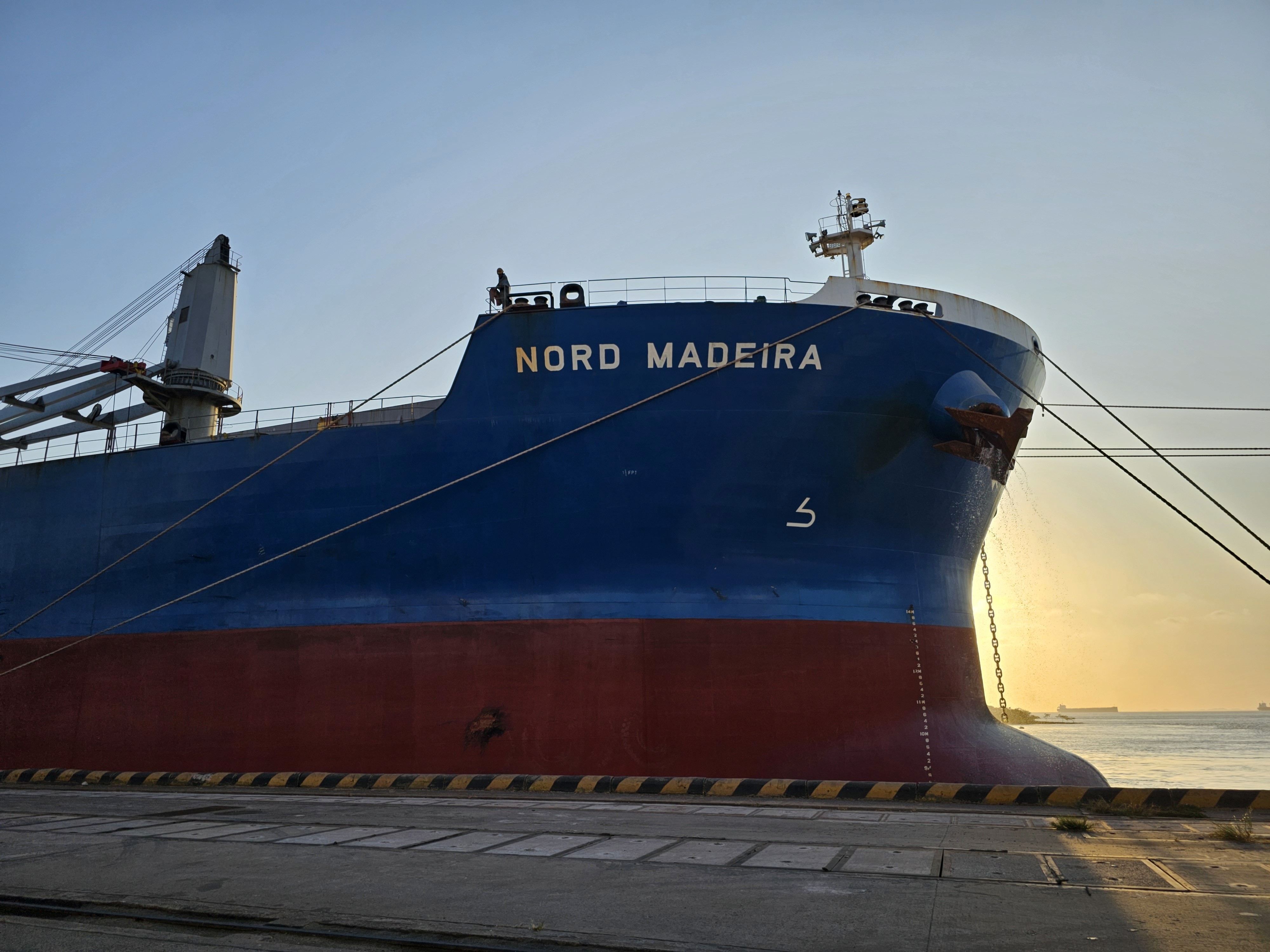 Bulk carrier Nord Madeira alongside Tegram Terminal at Itaqui Port, showing draft marks prior to grain loading for draft survey attendance.