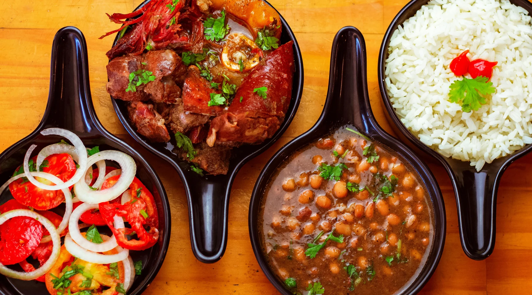 Rice and beans in pans