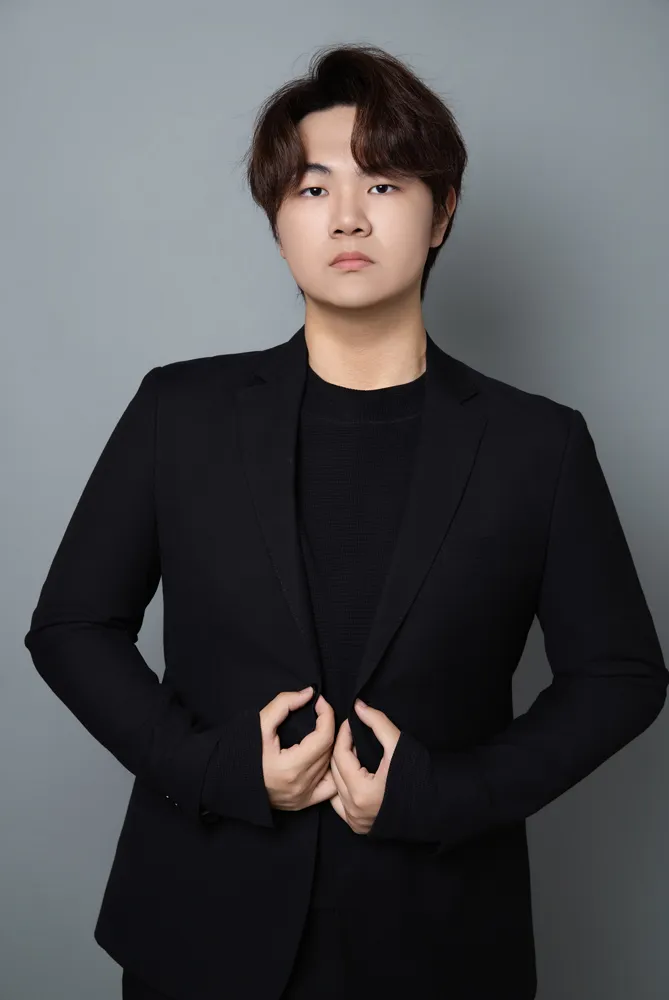 Confident Young Man in Interior