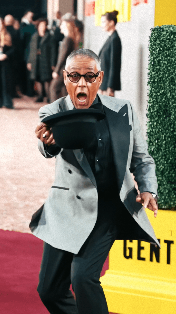 Woman in black outfit posing with arms raised