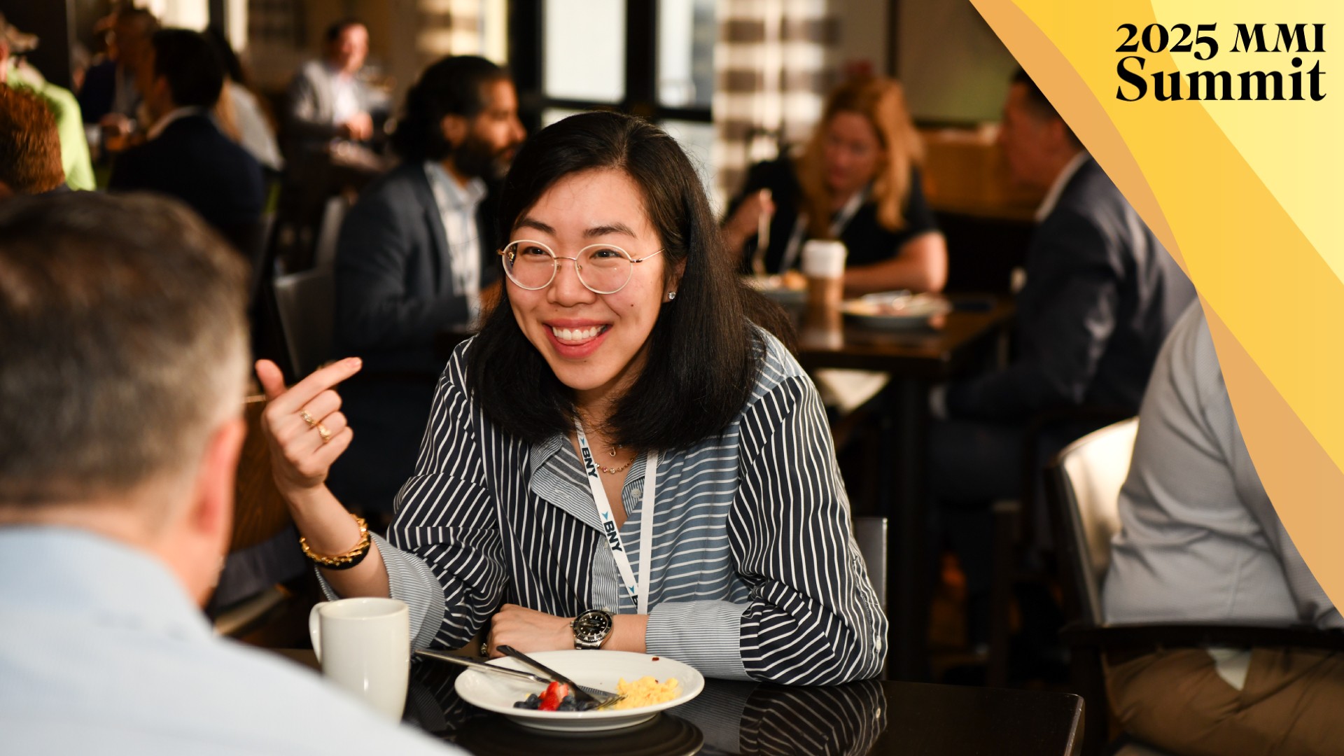 2025 MMI Summit photo with branded border of woman enjoying a networking lunch