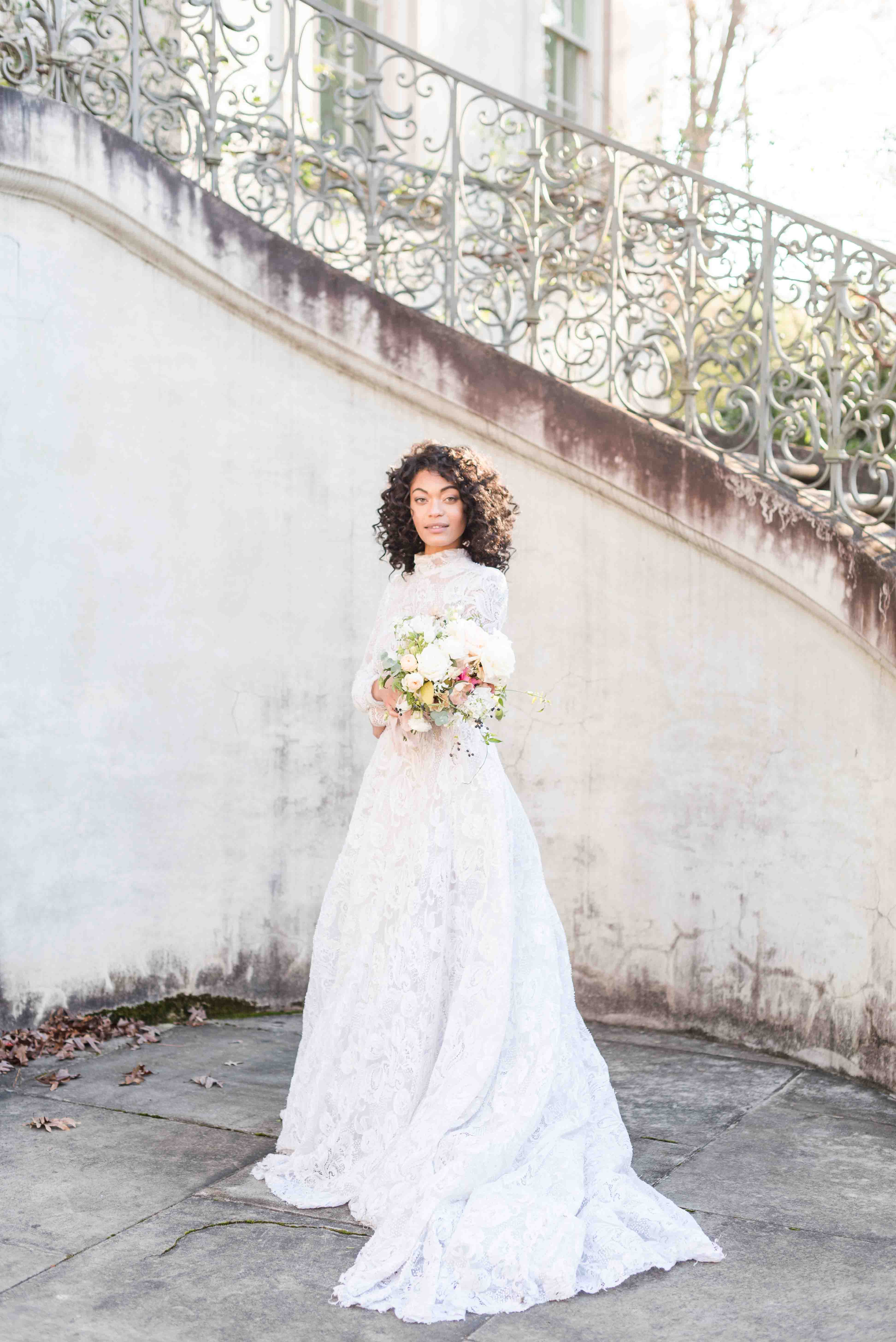 Portrait of bride holding bouquet at the Swan House in Atlanta, Georgia.