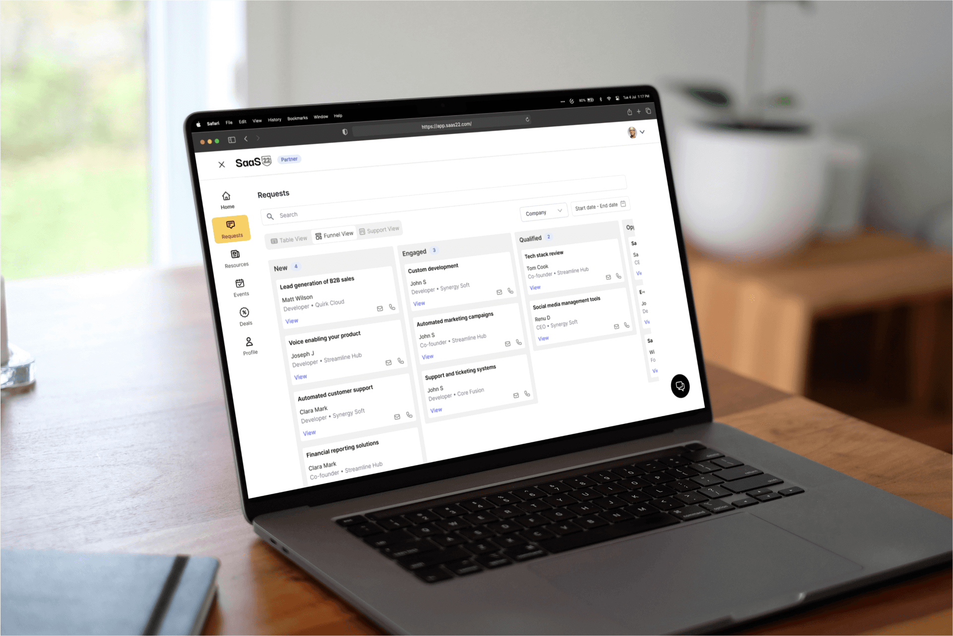 Kanban view of leads in SaaS22 web app on a laptop