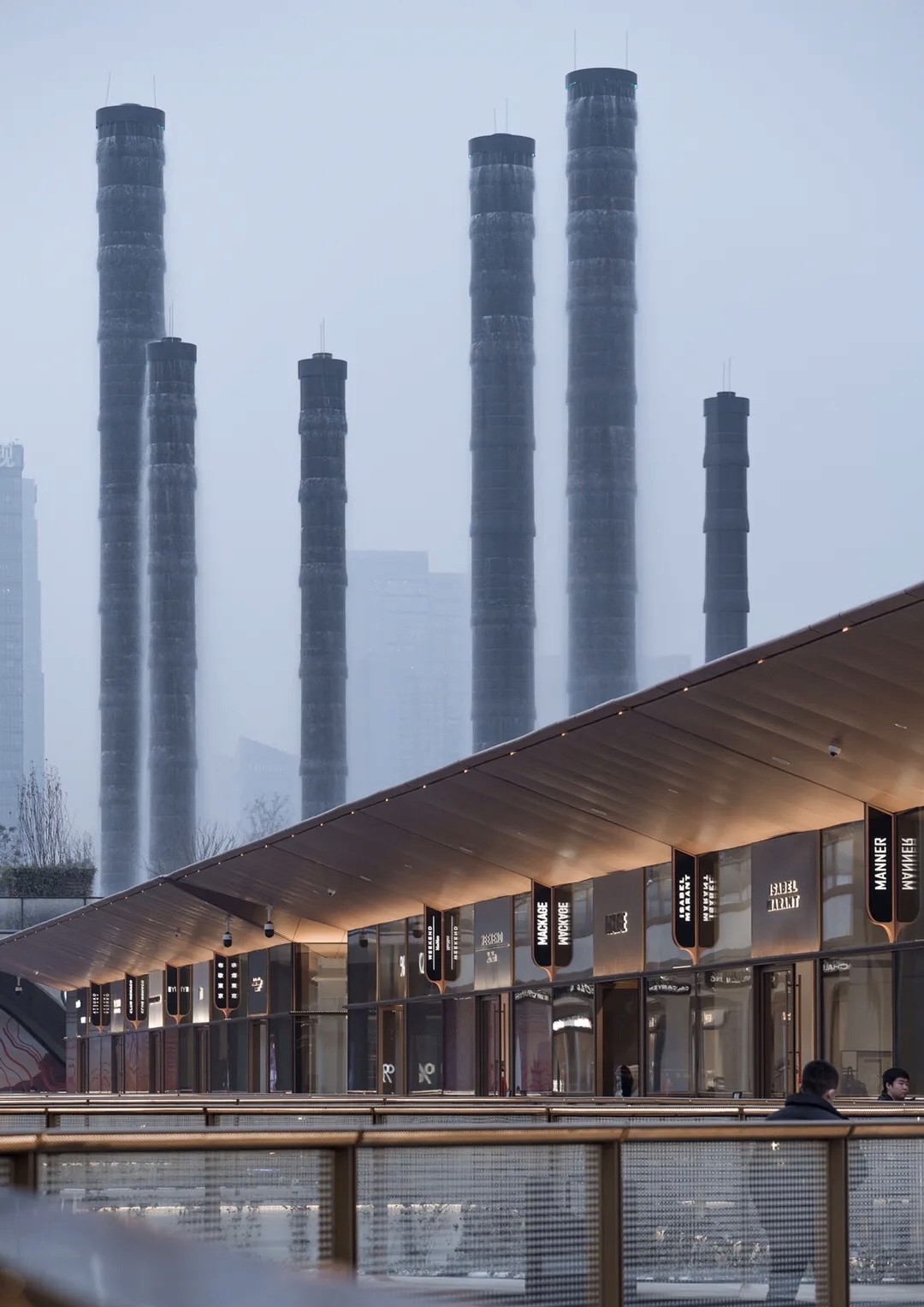 Street view of Chengdu SKP with Vitality Towers in background
