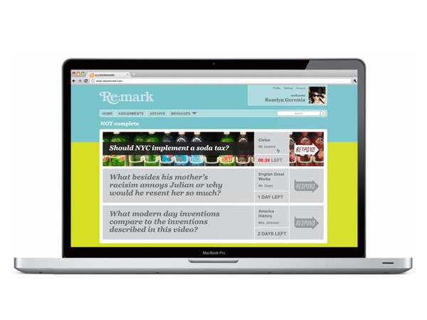 A silver MacBook Pro laptop is open, displaying a webpage from Remark. The webpage features a light blue header and a yellow-green sidebar. The Remark logo is prominently displayed at the top left. Navigation links including "HOME," "ASSIGNMENTS," "ARCHIVE," and "MESSAGES" are visible. A user profile section shows "Roselyn Geremia." A prominent question reads, "Should NYC implement a soda tax?" accompanied by a photo of soda bottles and a response button. Below the question, a response section asks, "What modern day inventions compare to the inventions described in this video?" The laptop is centered against a white background.
