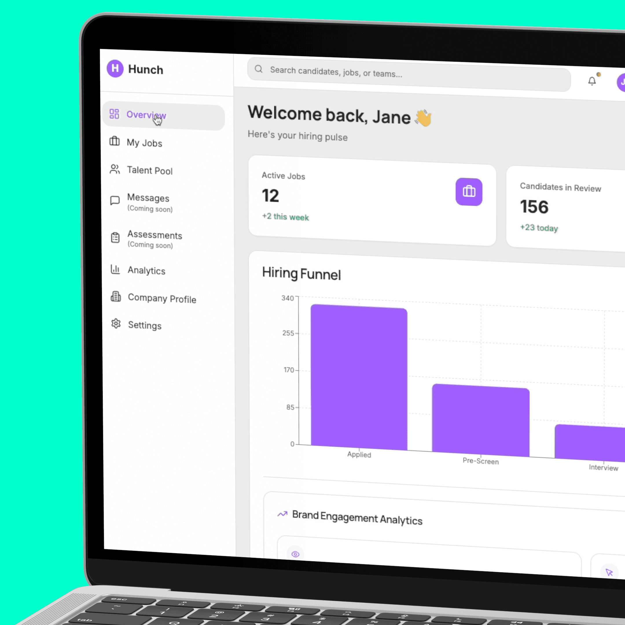 A smiling man wearing glasses in an office setting.