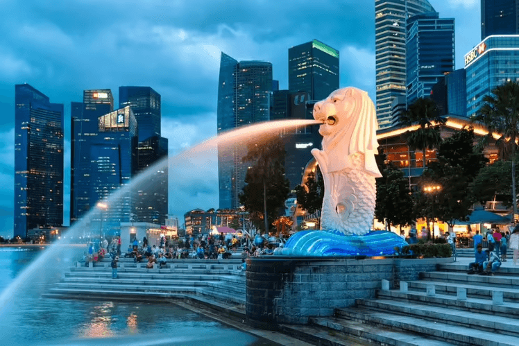 The image displays the Merlion Park in Singapore