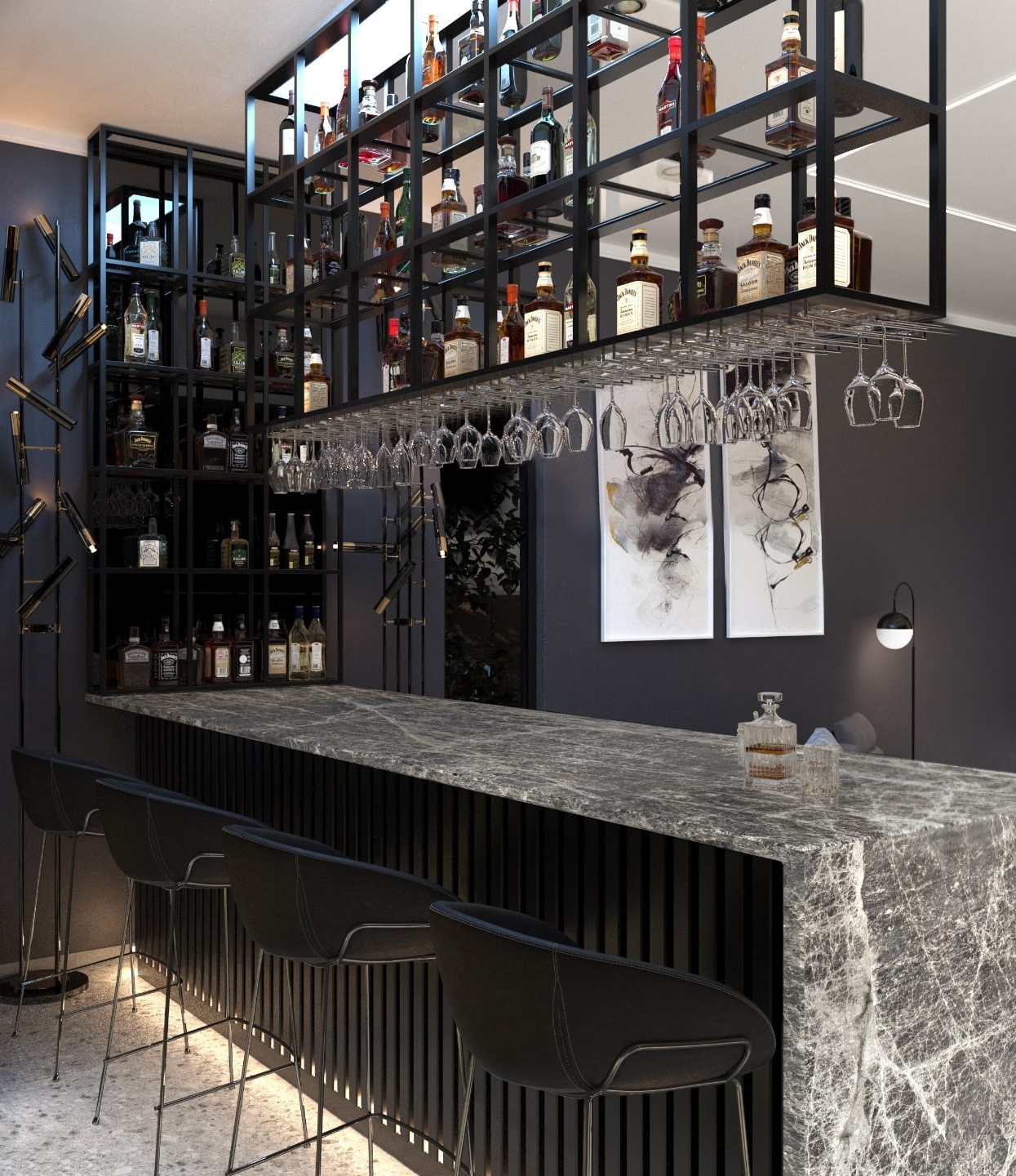 Modern bar with dark cabinets and grey countertop and suspended glassware from the ceiling
