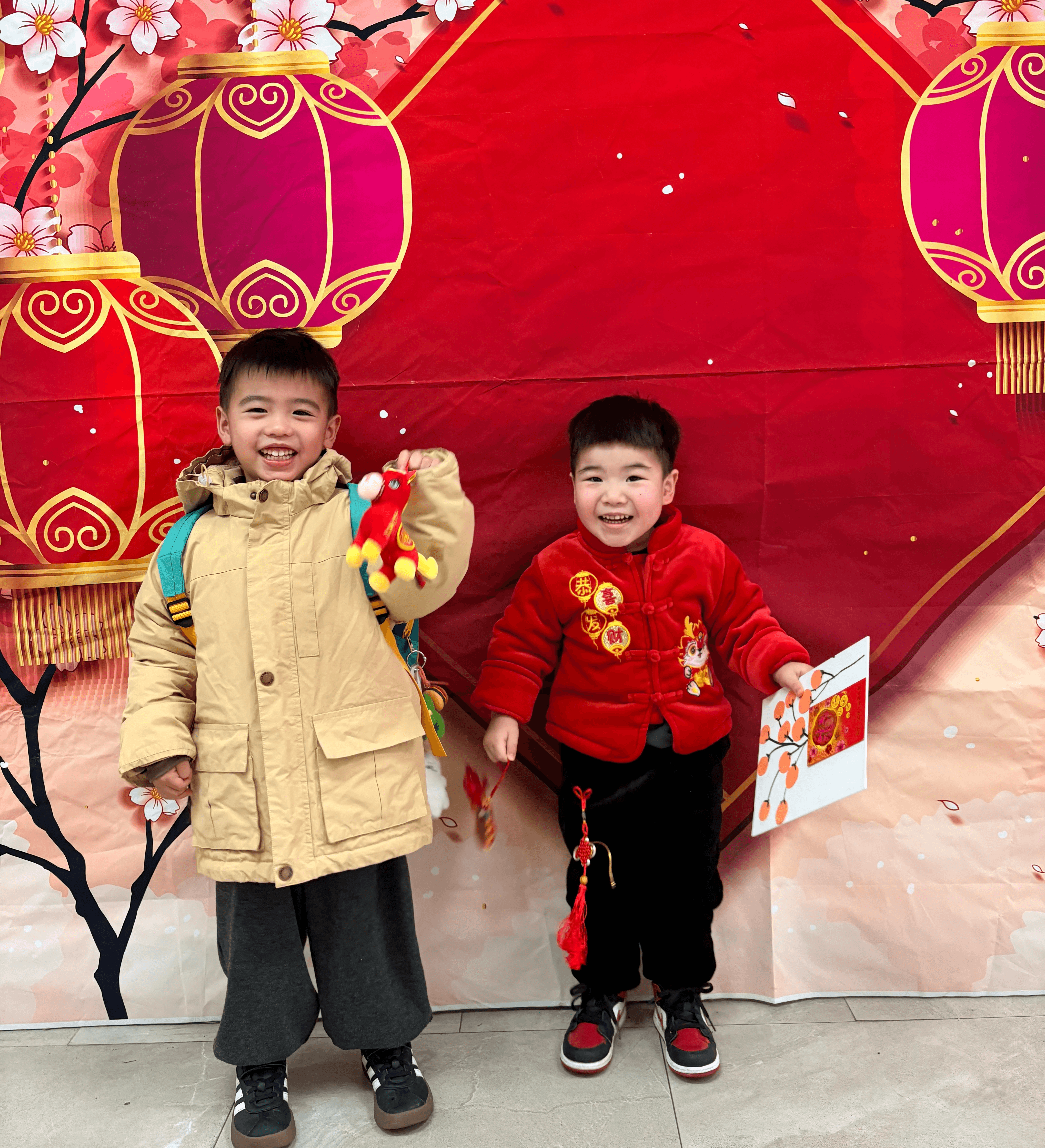 Adorable young participants pose with their goodies from a Lunar New Year celebration.