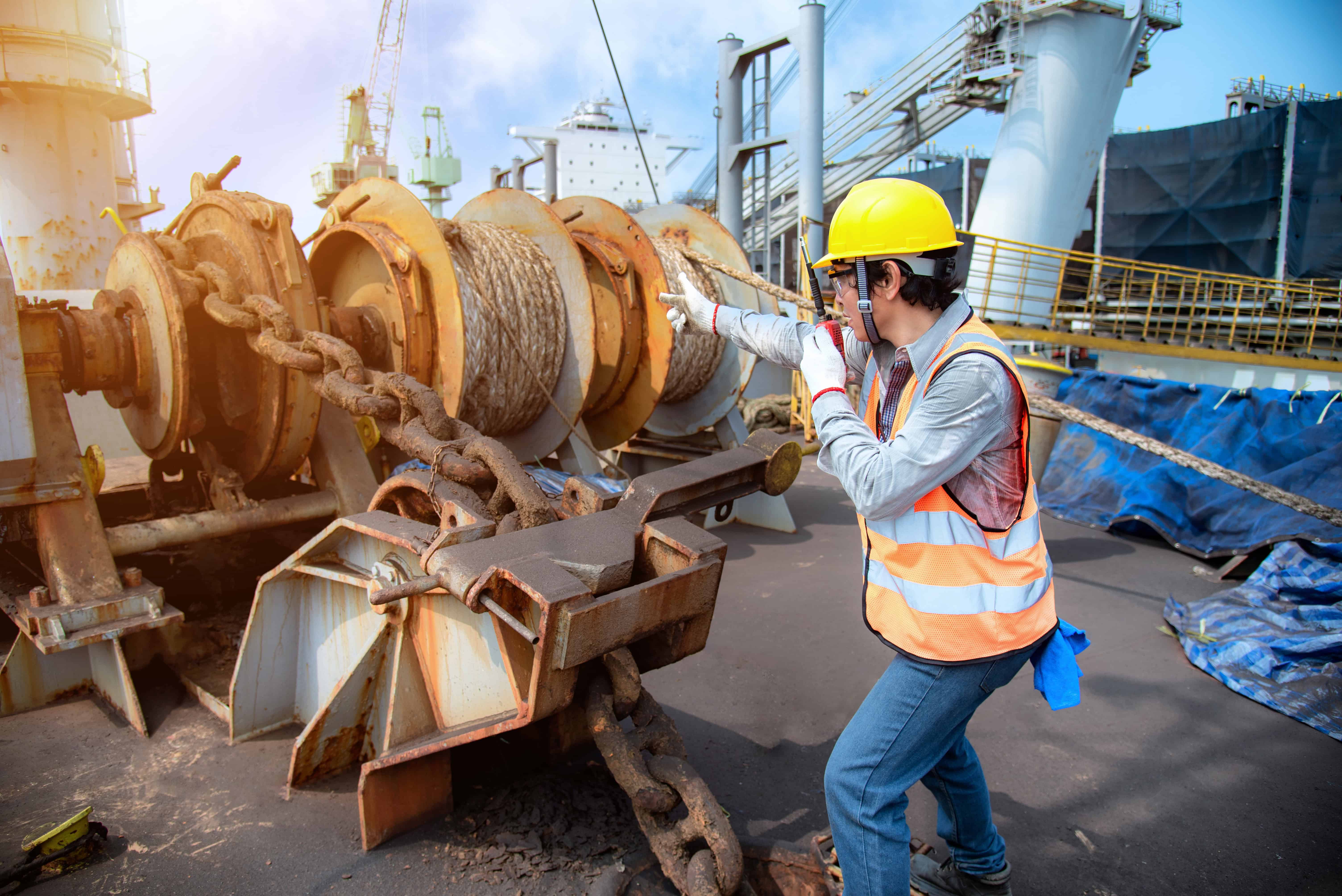Engineer on a cargo ship checking anchor handling equipment and needing to be vigilant to avoid an incident