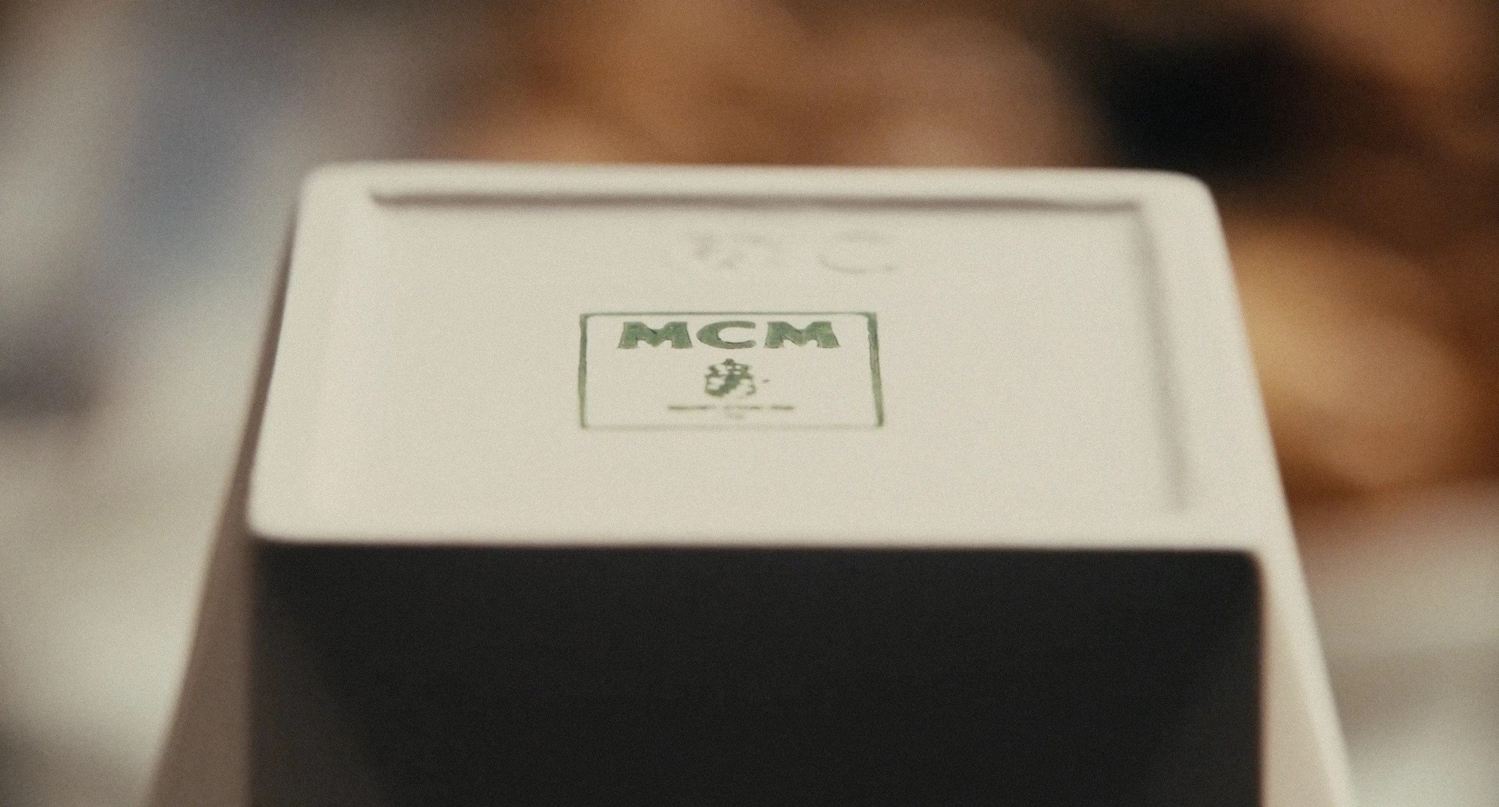 MCM’s 50th anniversary para MCM X NOWNESS: segundo fotograma de contenido multimedia que muestra escena editorial con movimiento y colores saturados.