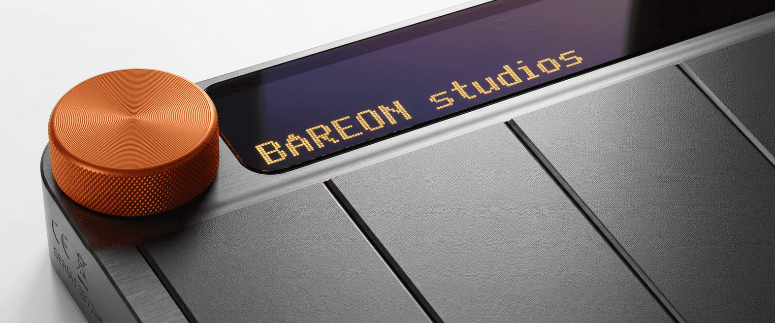 Close up Shot on the Riff Link Midi Control device with the Bareon Text.