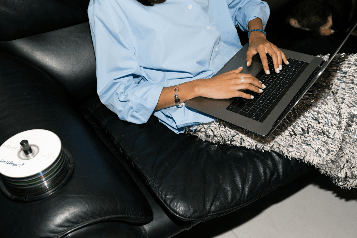 person writing on a piece of paper 