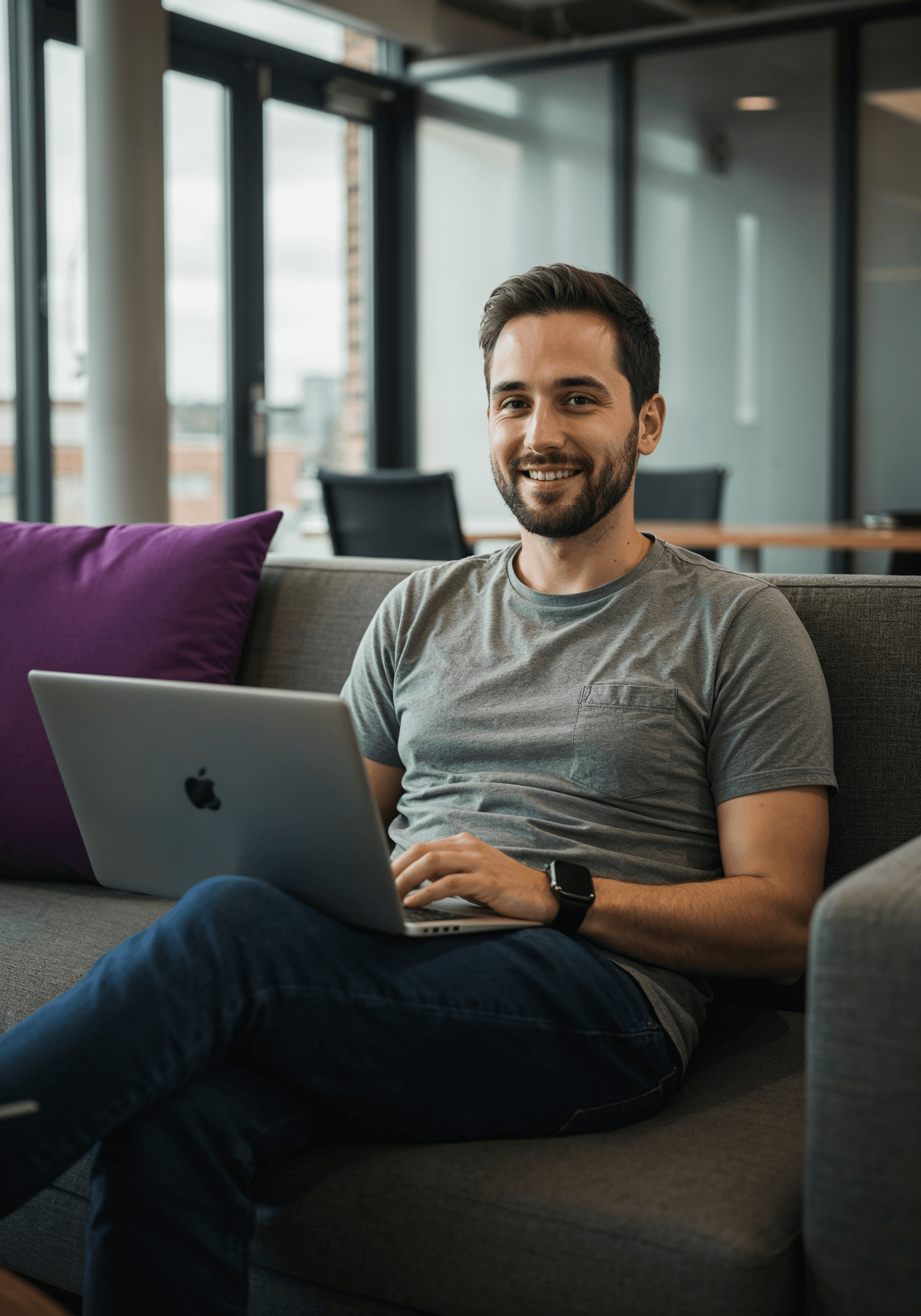 A woman works at a laptop