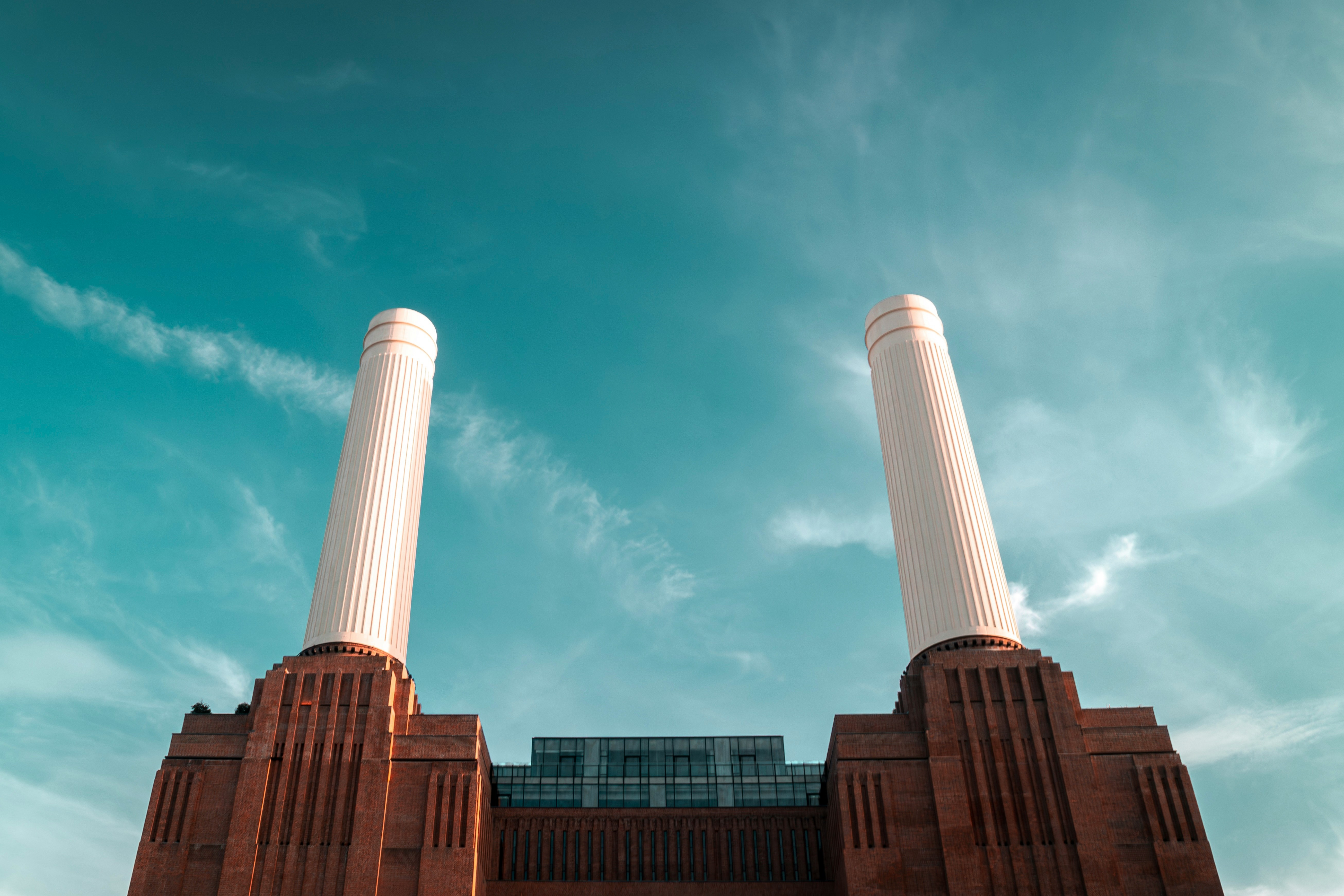 A large brick building with two tall white pillars